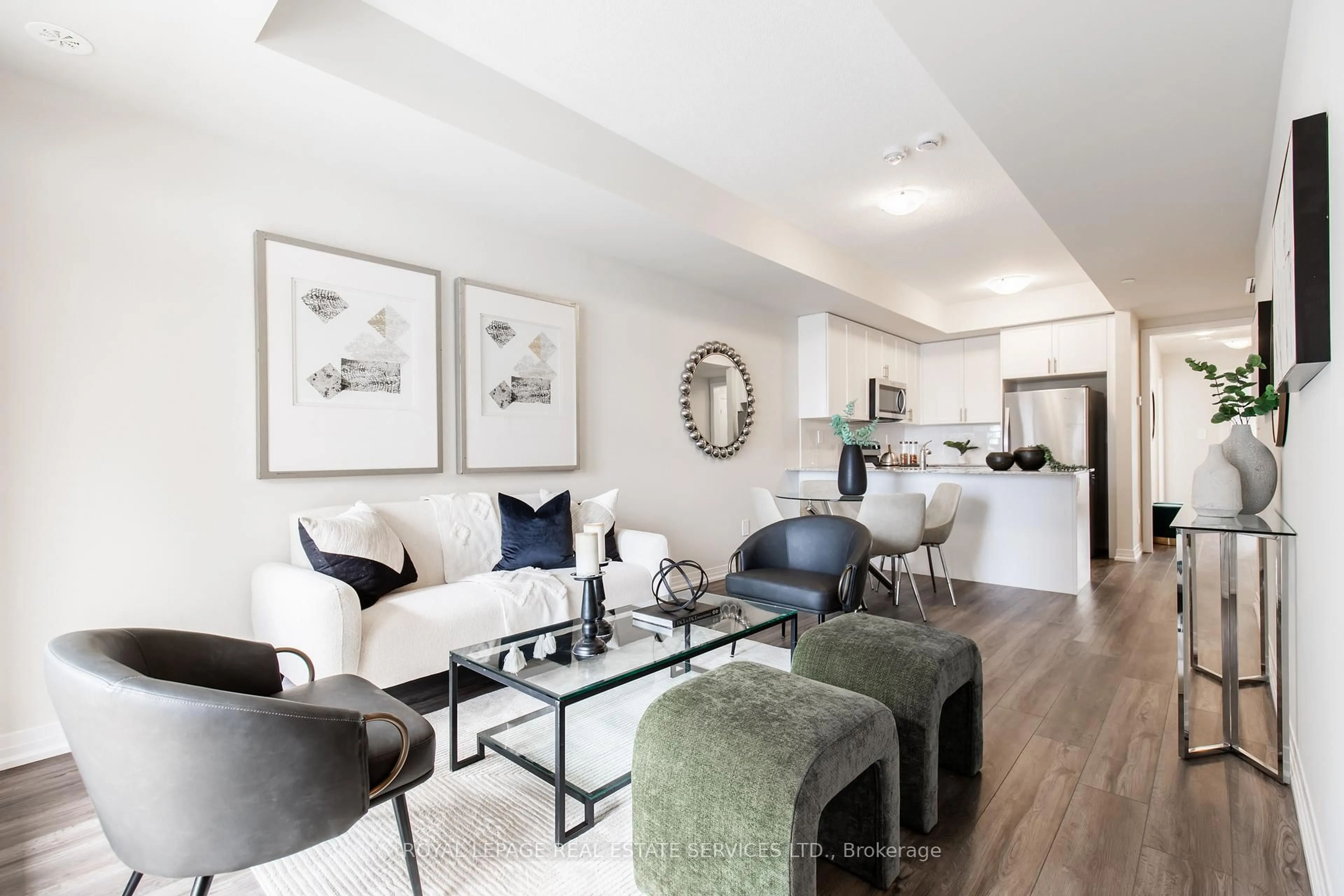 Living room with furniture, unknown for 1597 Rose Way #107, Milton Ontario L9E 1N4