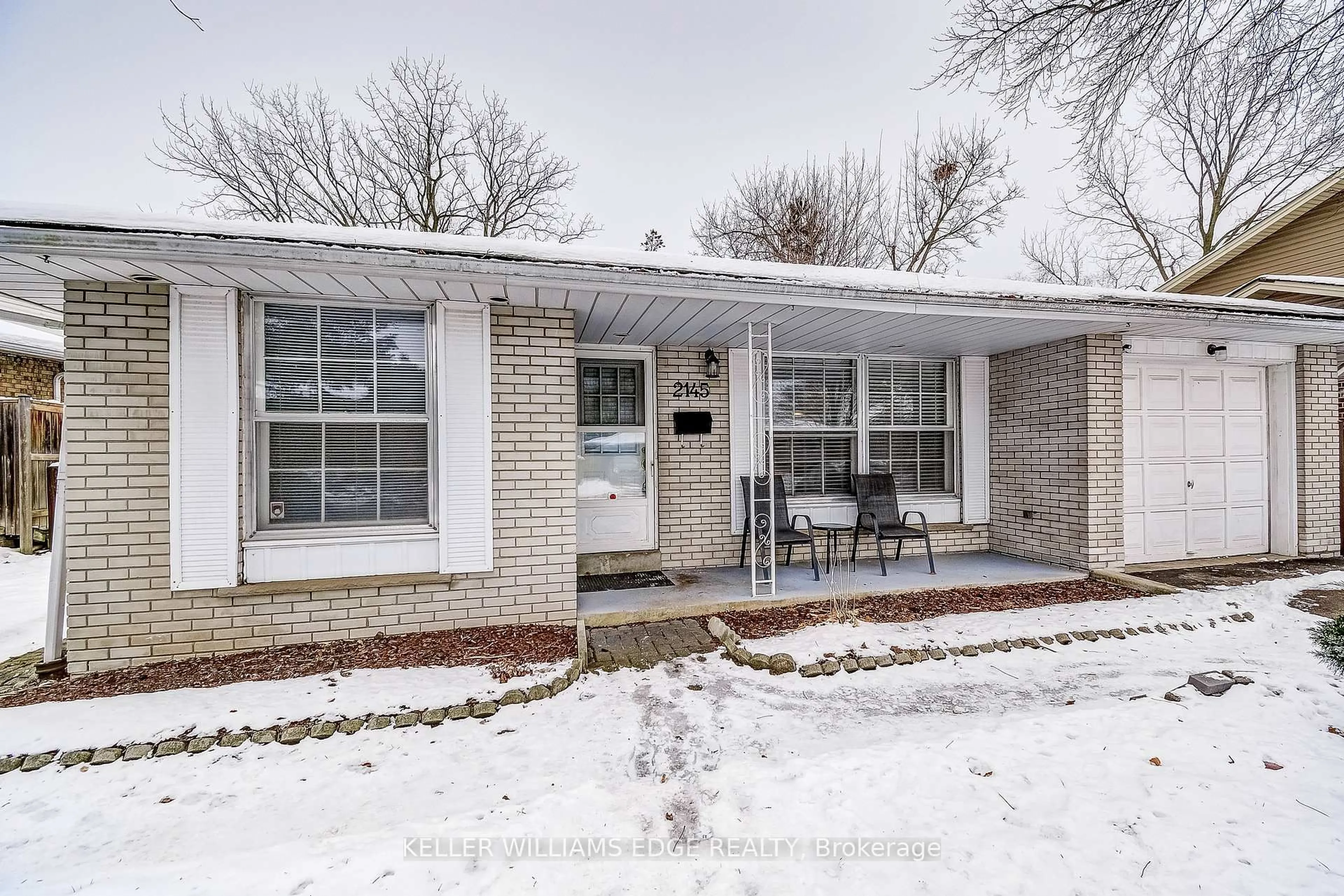 Home with brick exterior material, street for 2145 Sandringham Dr, Burlington Ontario L7P 1T8