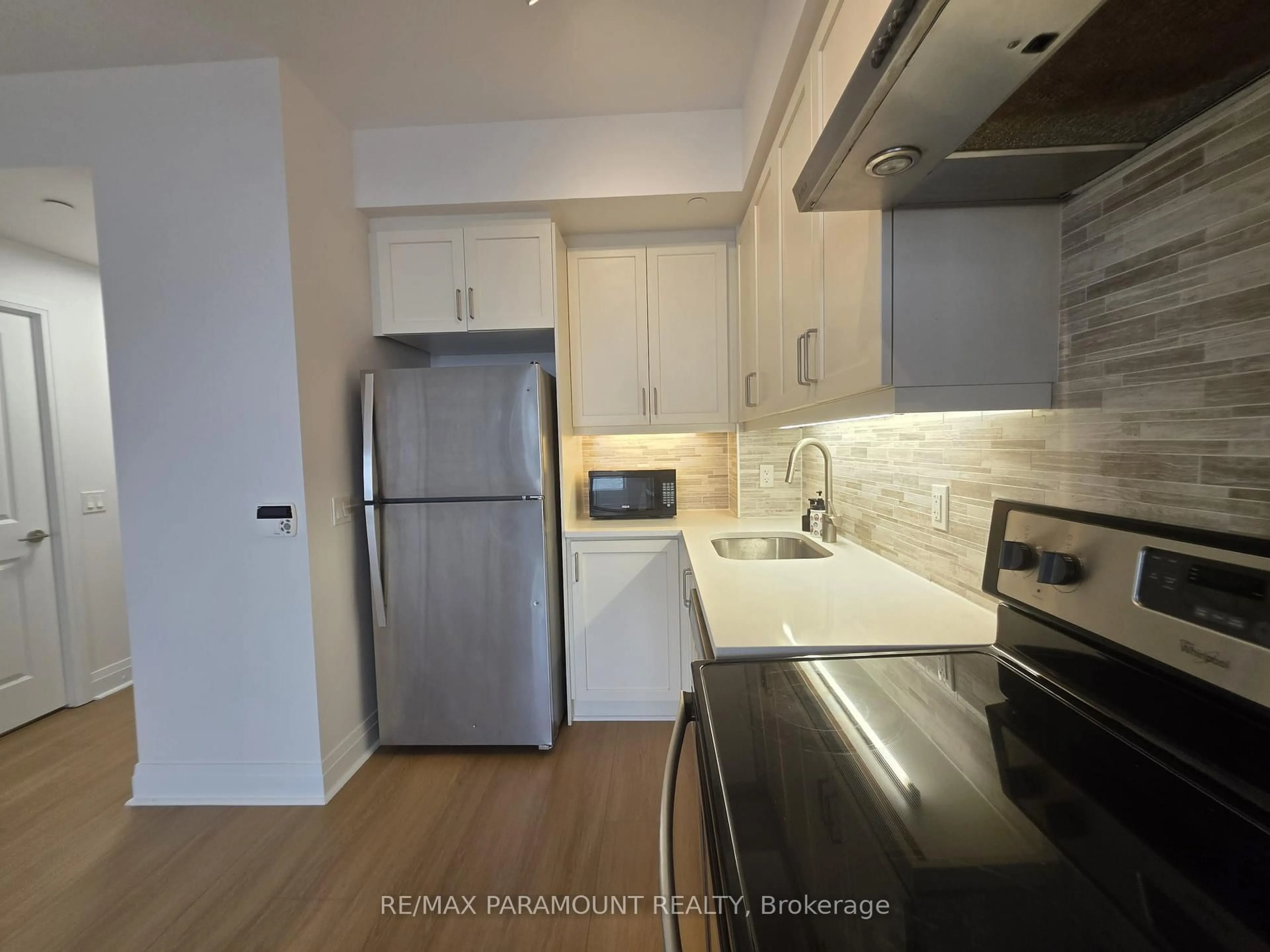 Standard kitchen, wood/laminate floor for 15 Zorra St #1508, Toronto Ontario M8Z 0C1