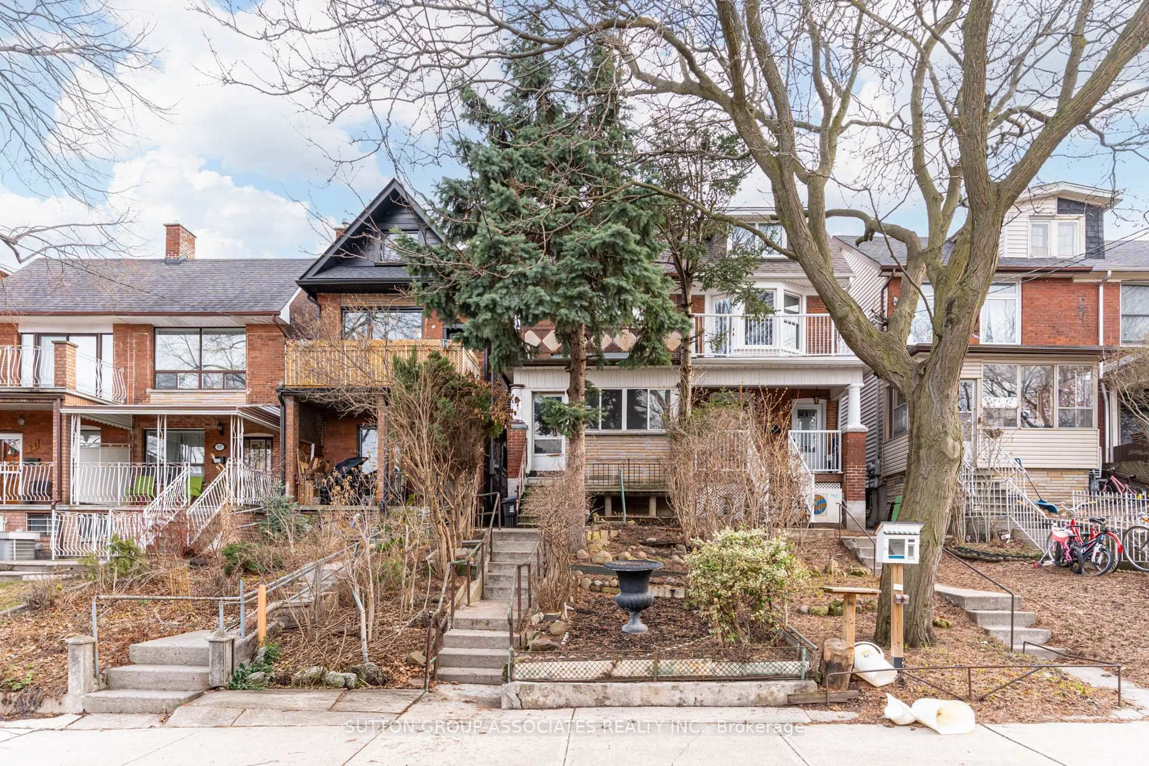 Home with brick exterior material, street for 97 Pendrith St, Toronto Ontario M6G 1R8