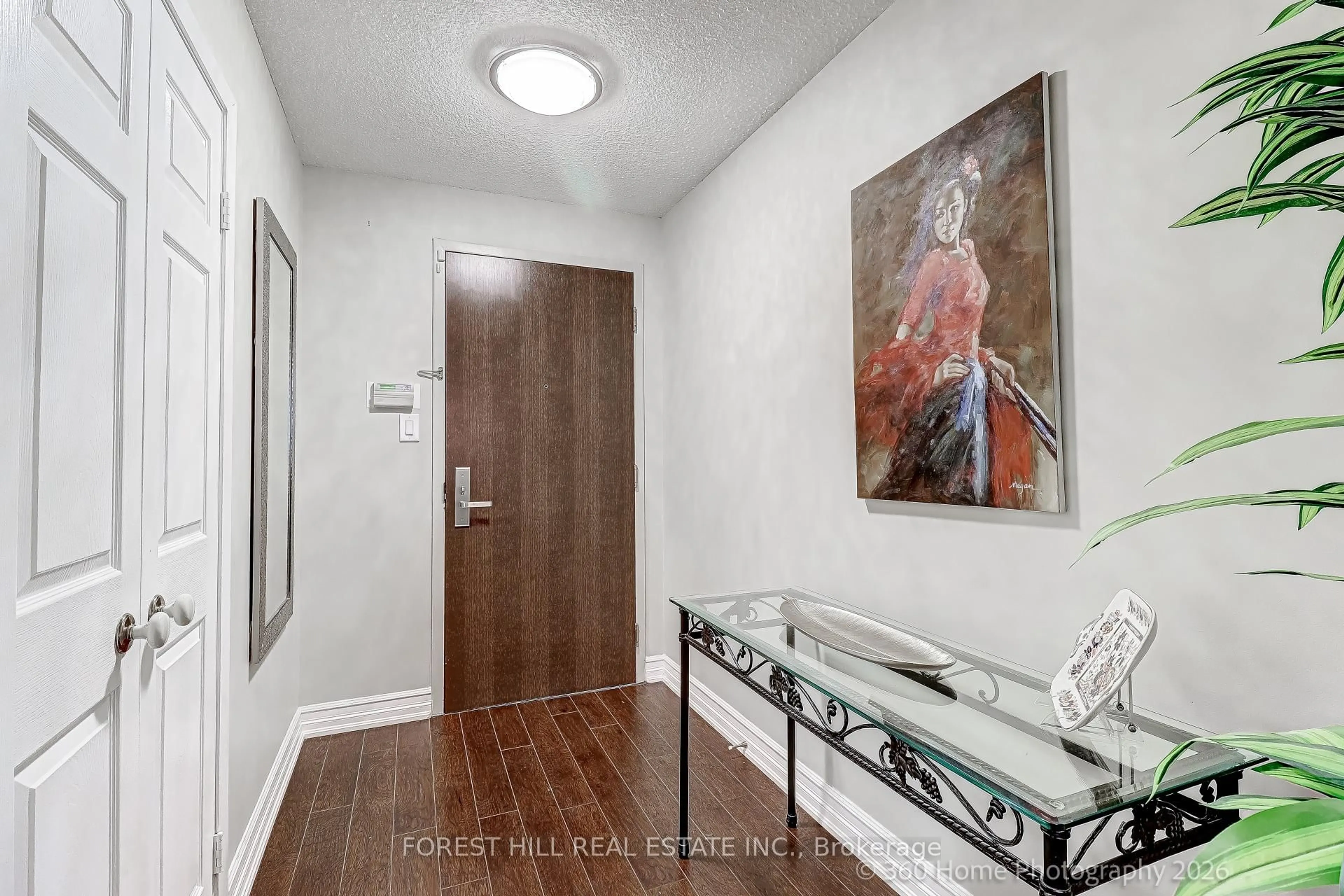 Indoor entryway for 45 Kingsbridge Garden Circ #204, Mississauga Ontario L5R 3K4