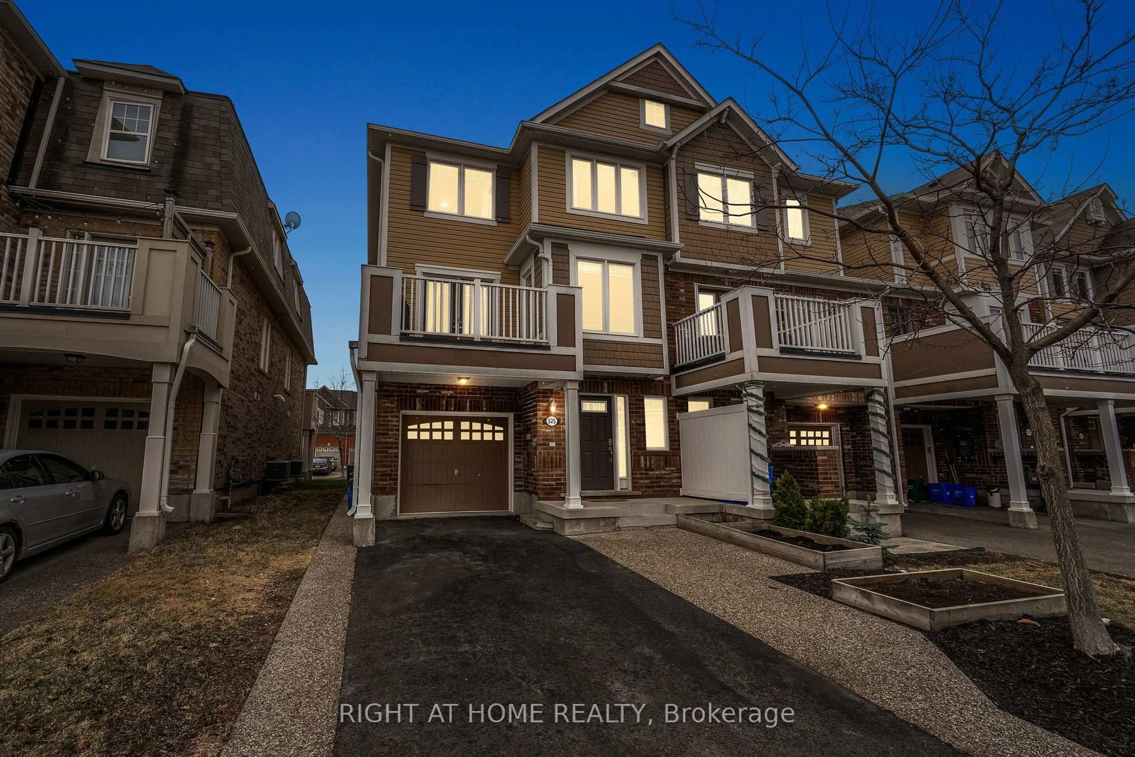 Home with brick exterior material, street for 525 Cavanagh Lane, Milton Ontario L9T 8G4