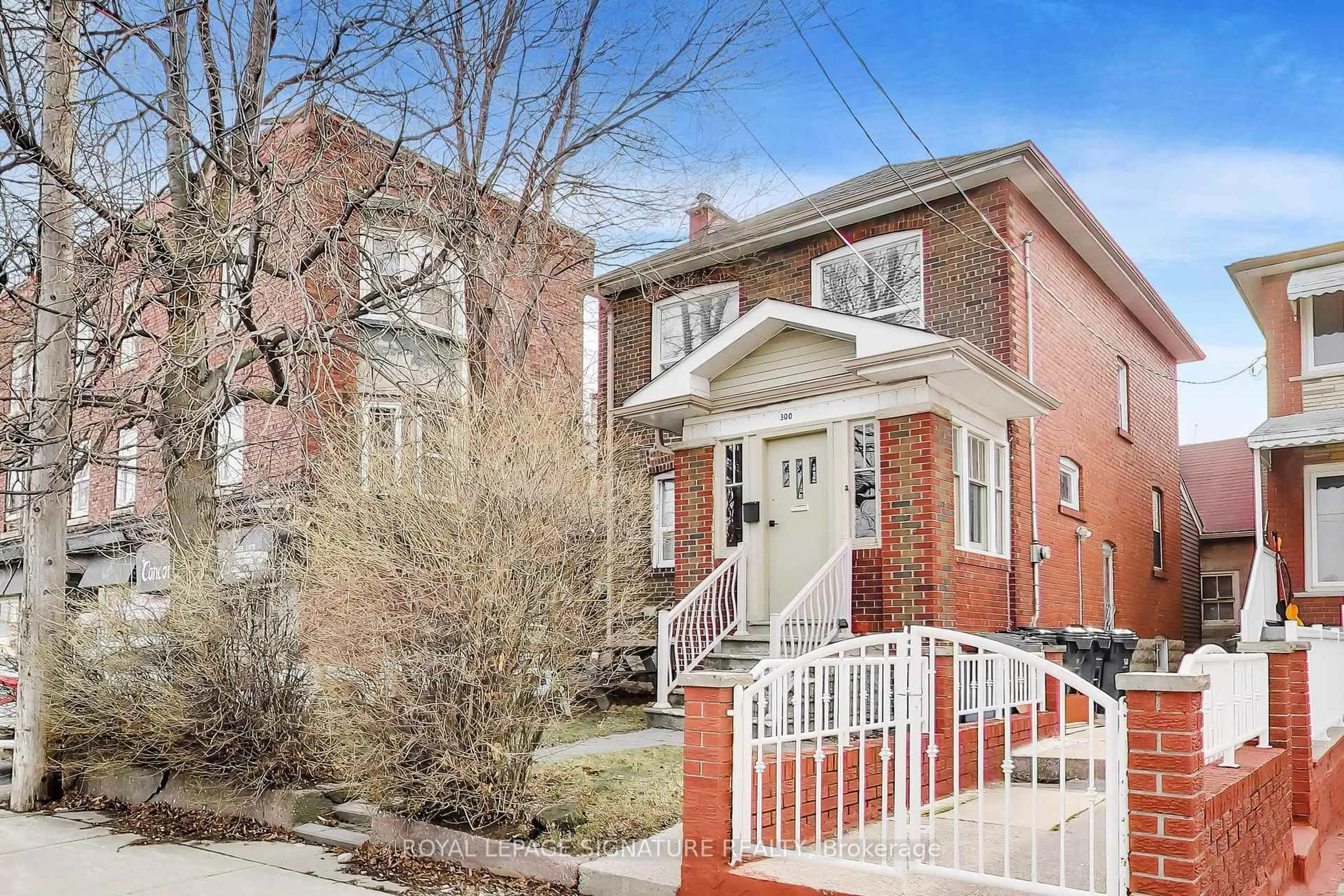Home with brick exterior material, street for 300 Concord Ave, Toronto Ontario M6H 2P6