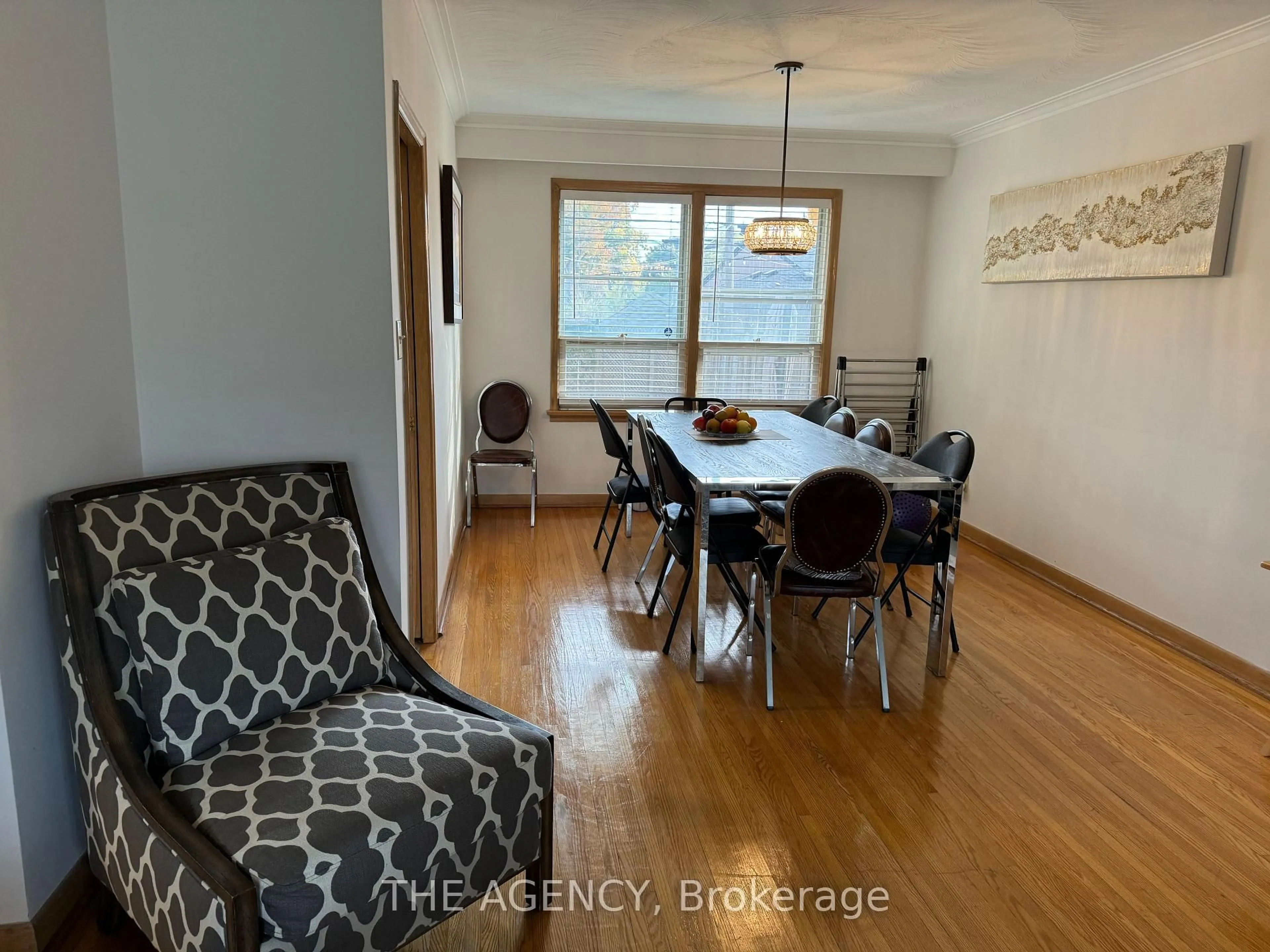 Dining room, wood/laminate floor for 64 Farningham Cres, Toronto Ontario M9B 3B6