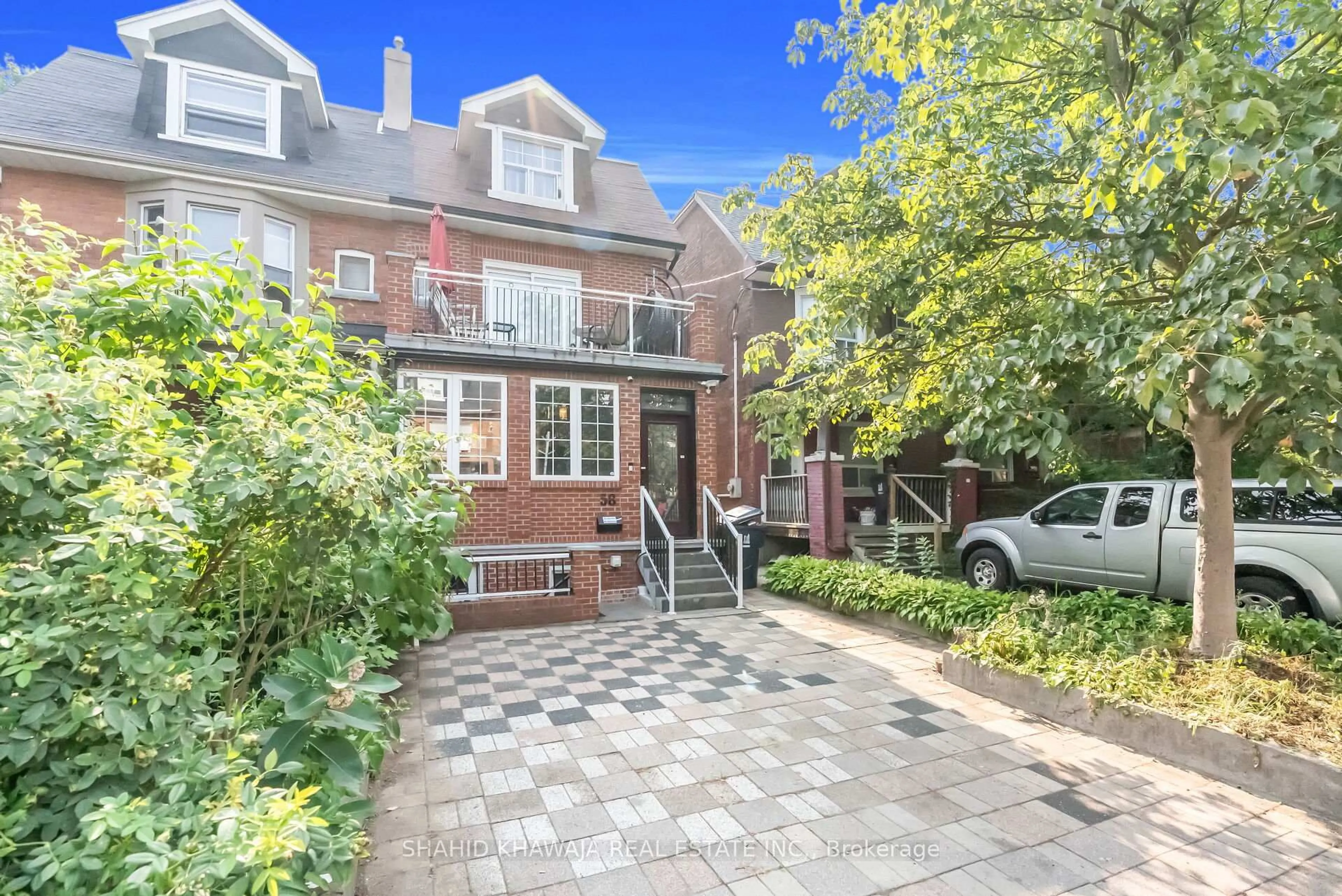 Home with brick exterior material, street for 58 Pauline Ave, Toronto Ontario M6H 3M8
