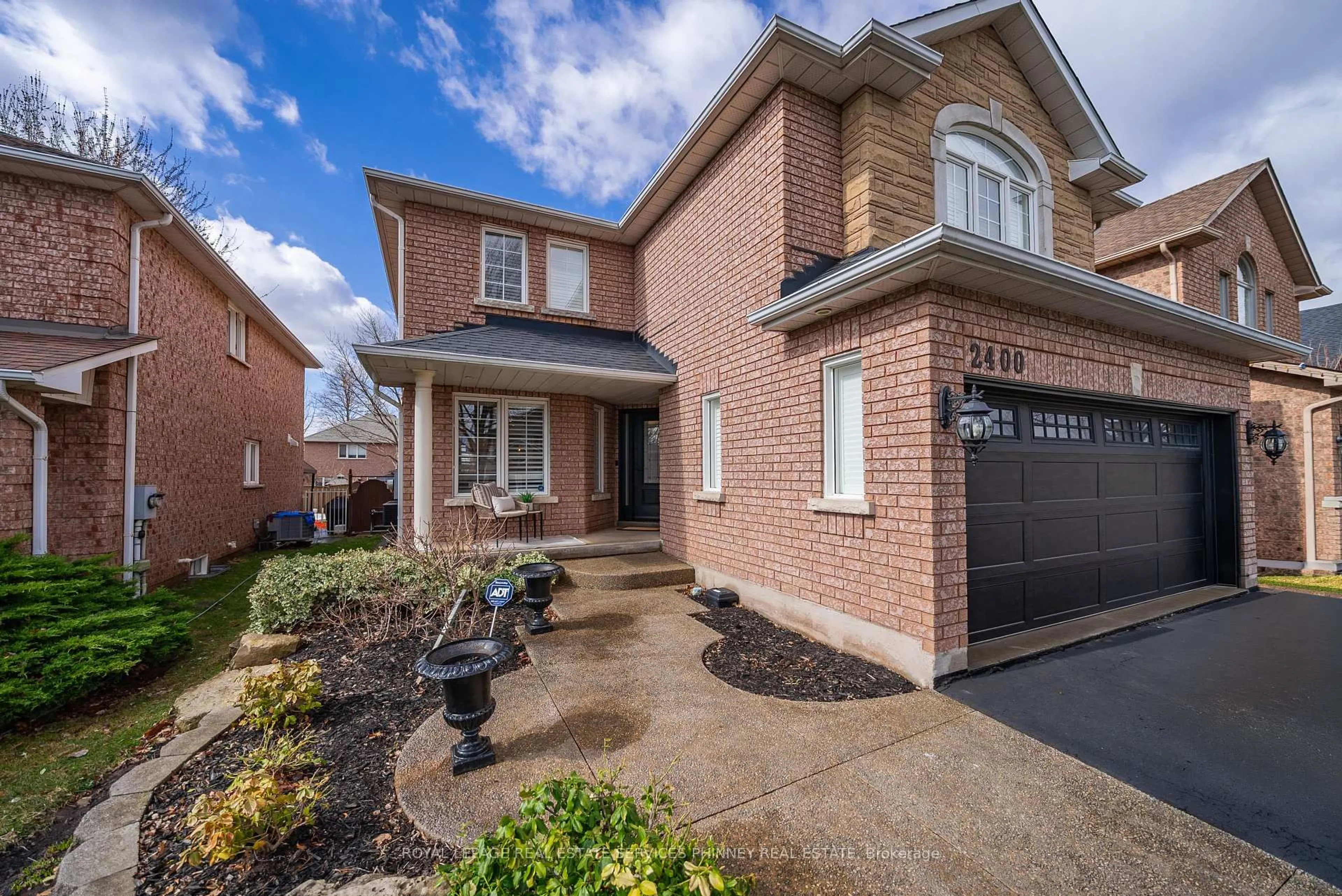 Home with brick exterior material, street for 2400 Eden Valley Dr, Oakville Ontario L6H 6K9