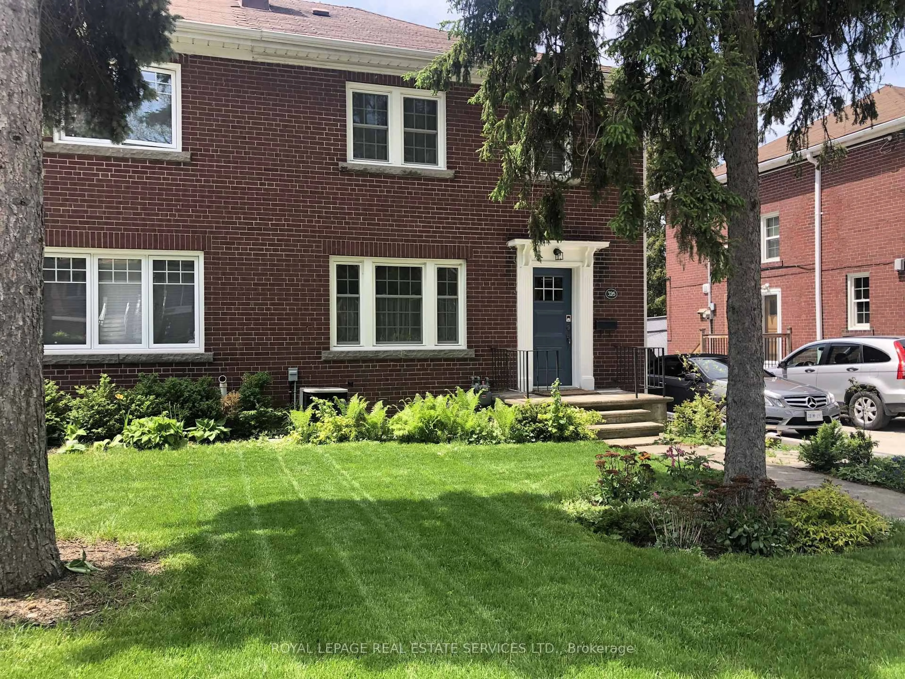 Home with brick exterior material, street for 326 Indian Grve, Toronto Ontario M6P 2H5