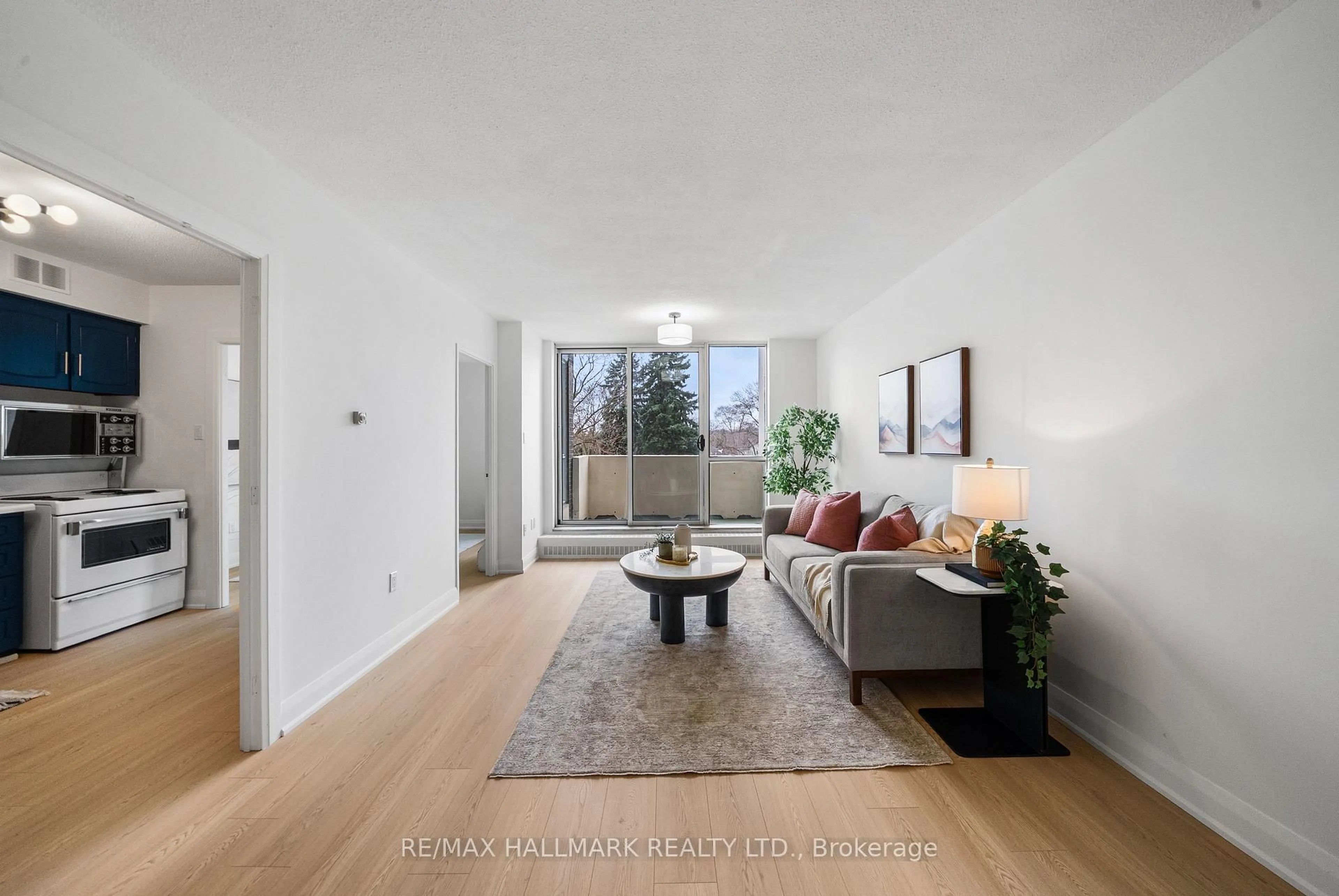 Living room with furniture, unknown for 35 Ormskirk Ave #209, Toronto Ontario M6S 1A8