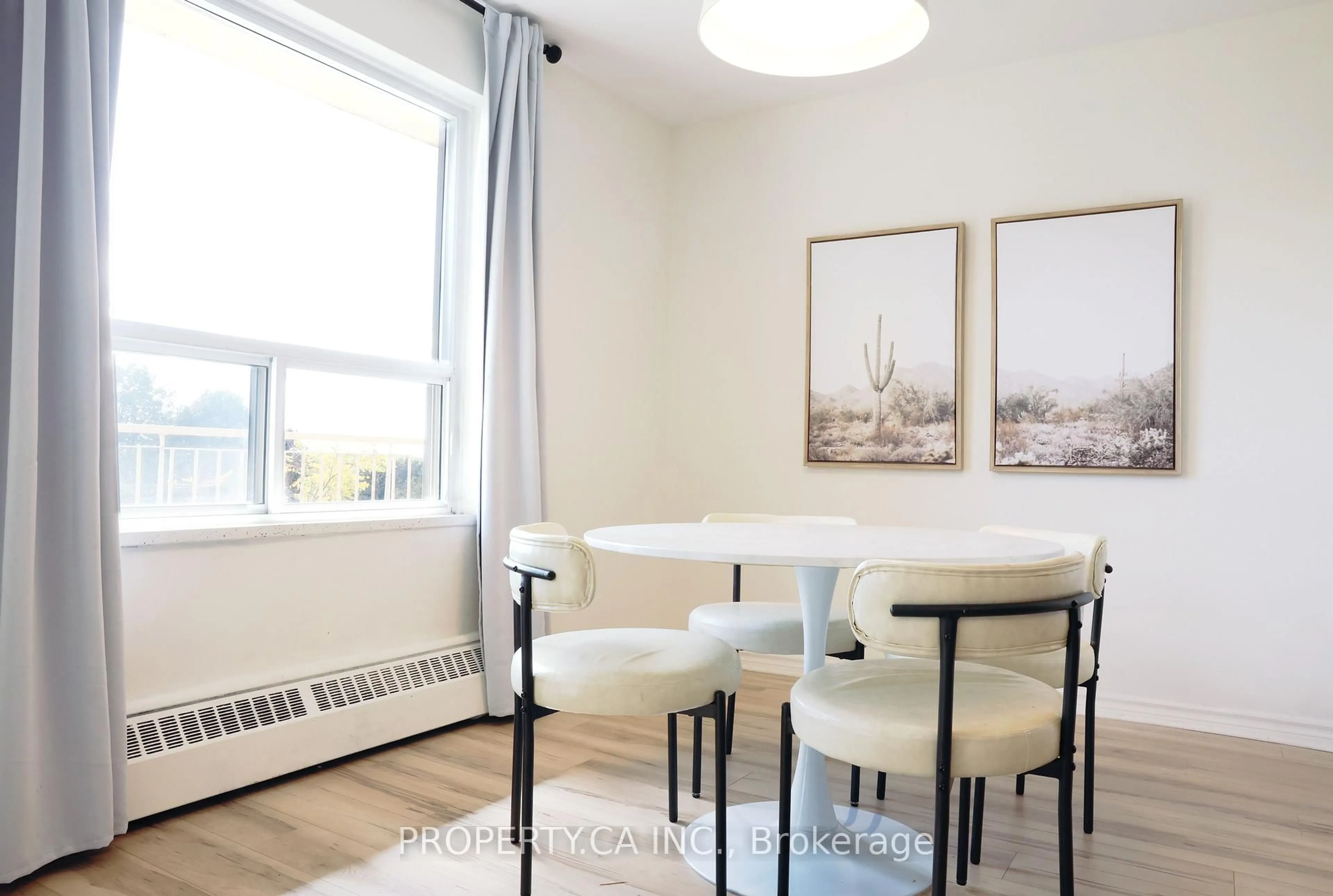 Dining room, wood/laminate floor for 60 Gulliver Rd #303, Toronto Ontario M6M 2M6