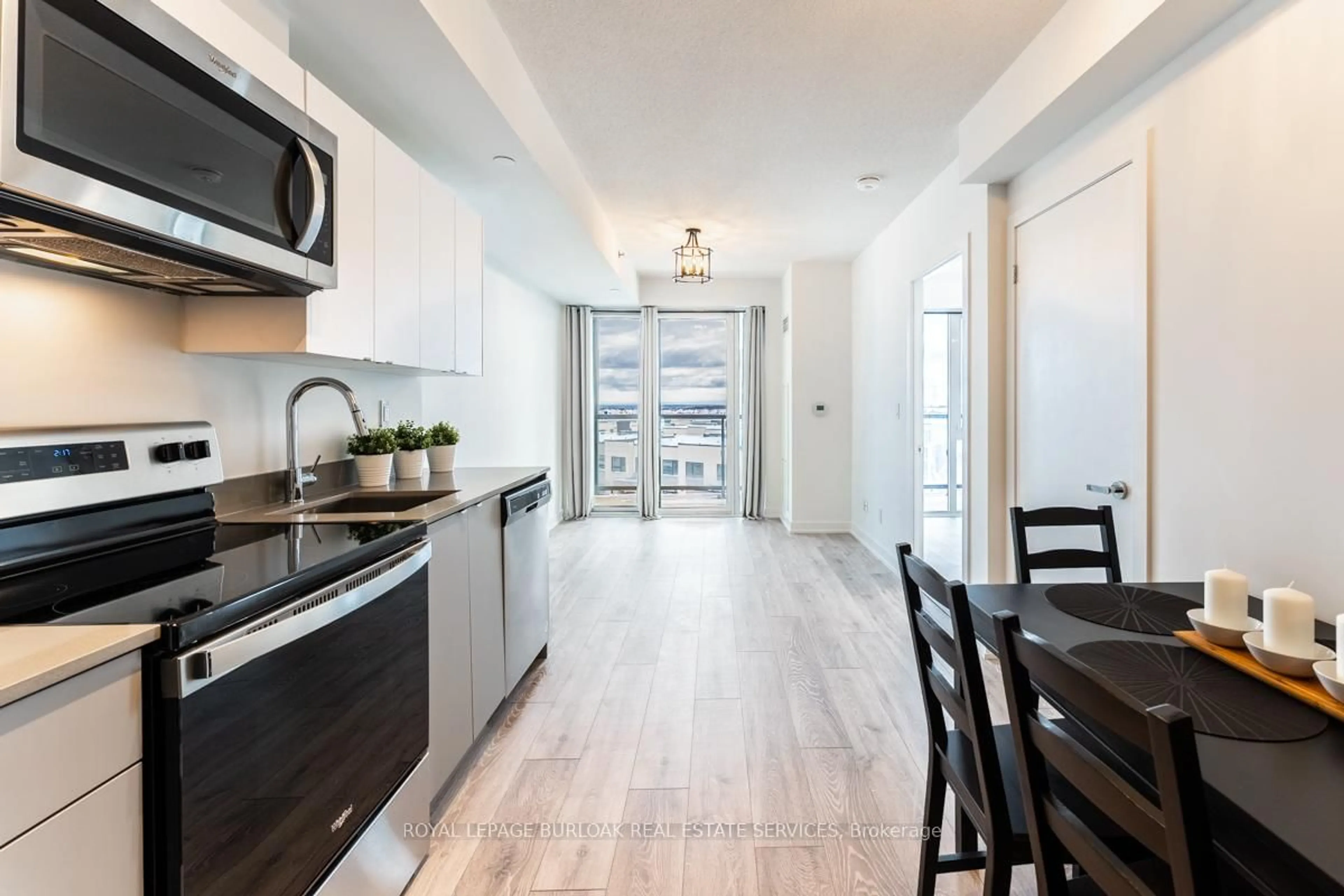 Open concept kitchen, ceramic/tile floor for 3210 Dakota Common #A504, Burlington Ontario L7M 2A8