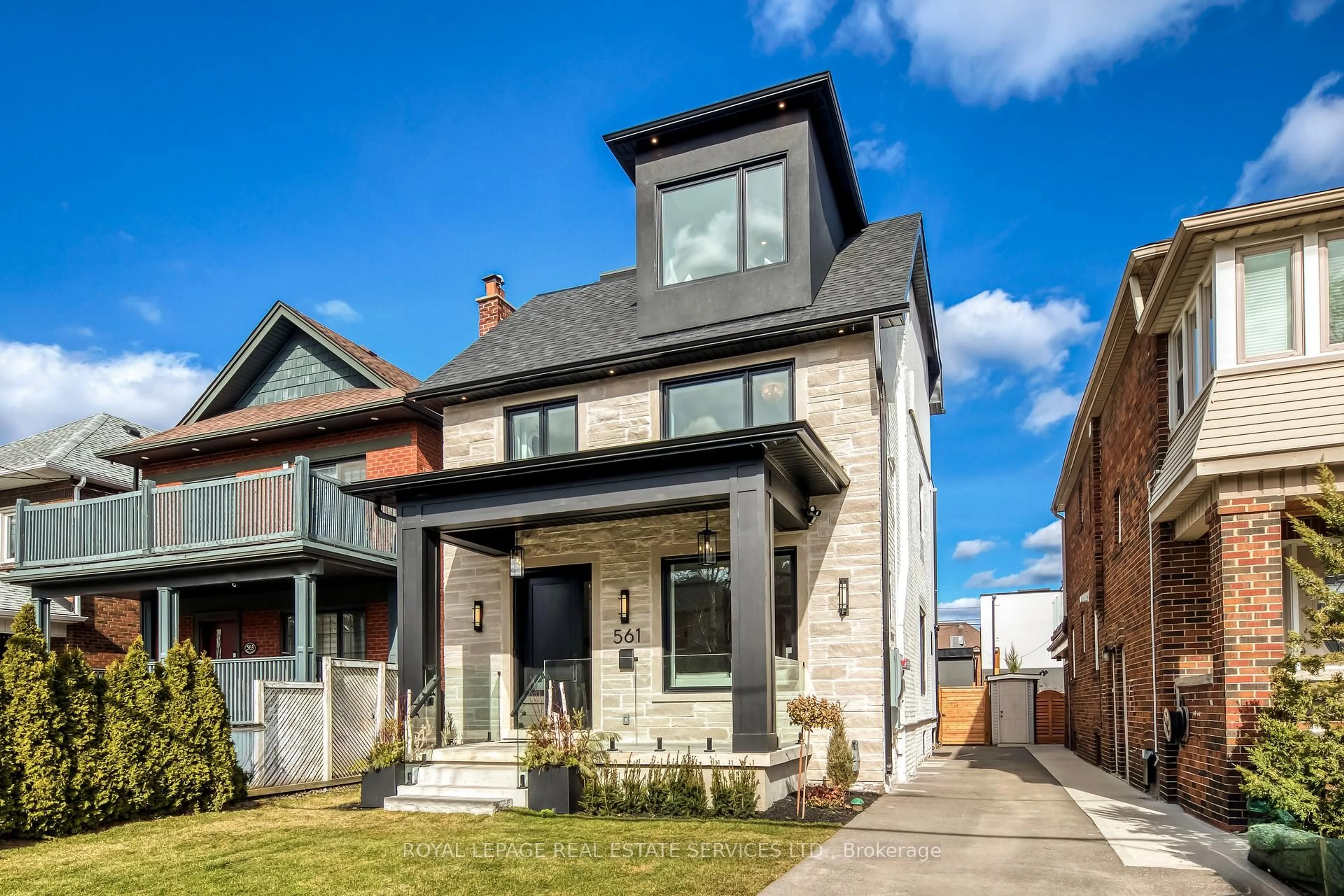 Home with brick exterior material, street for 561 Durie St, Toronto Ontario M6S 3H2