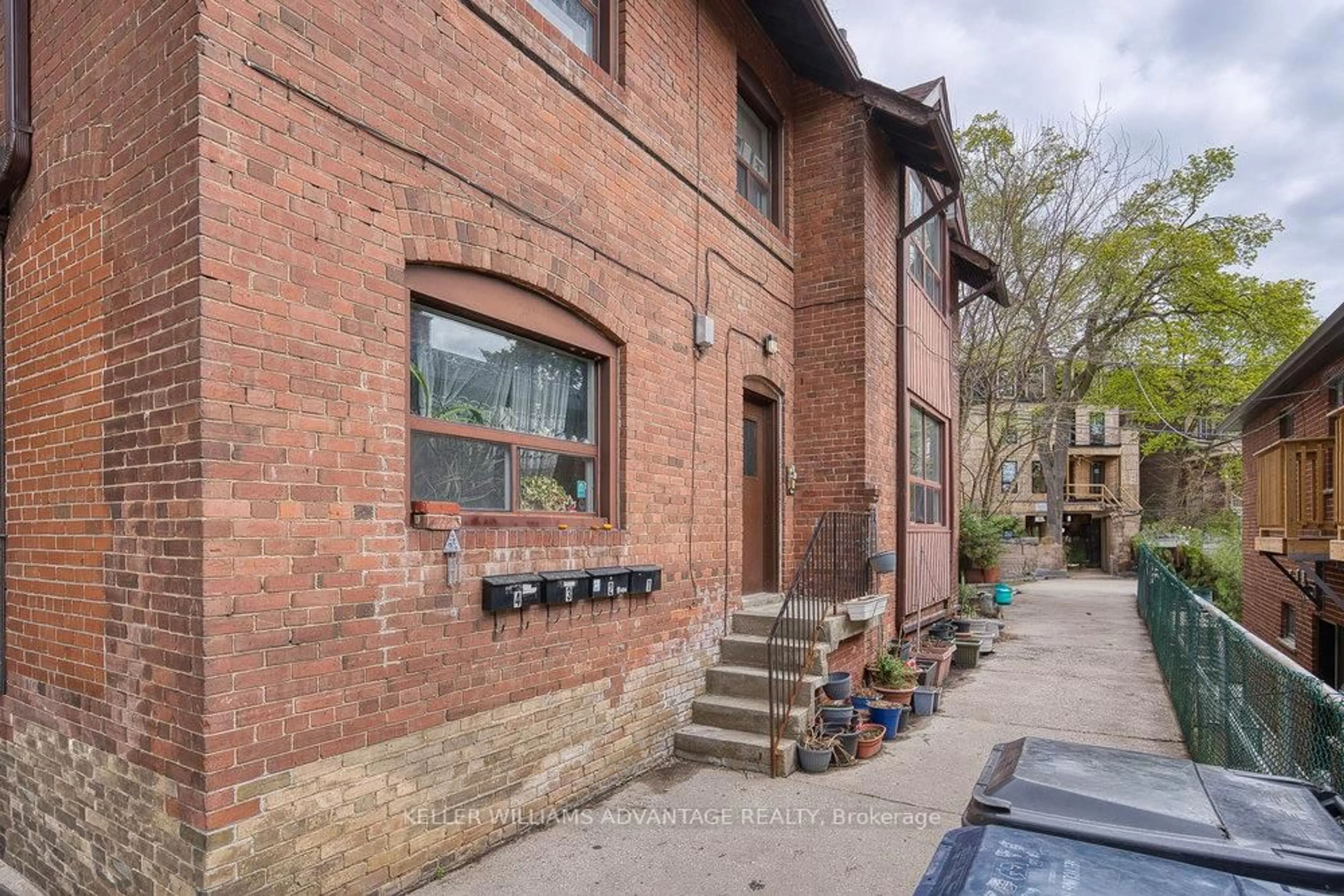 Home with brick exterior material, street for 24 Indian Road Cres, Toronto Ontario M6P 2G1