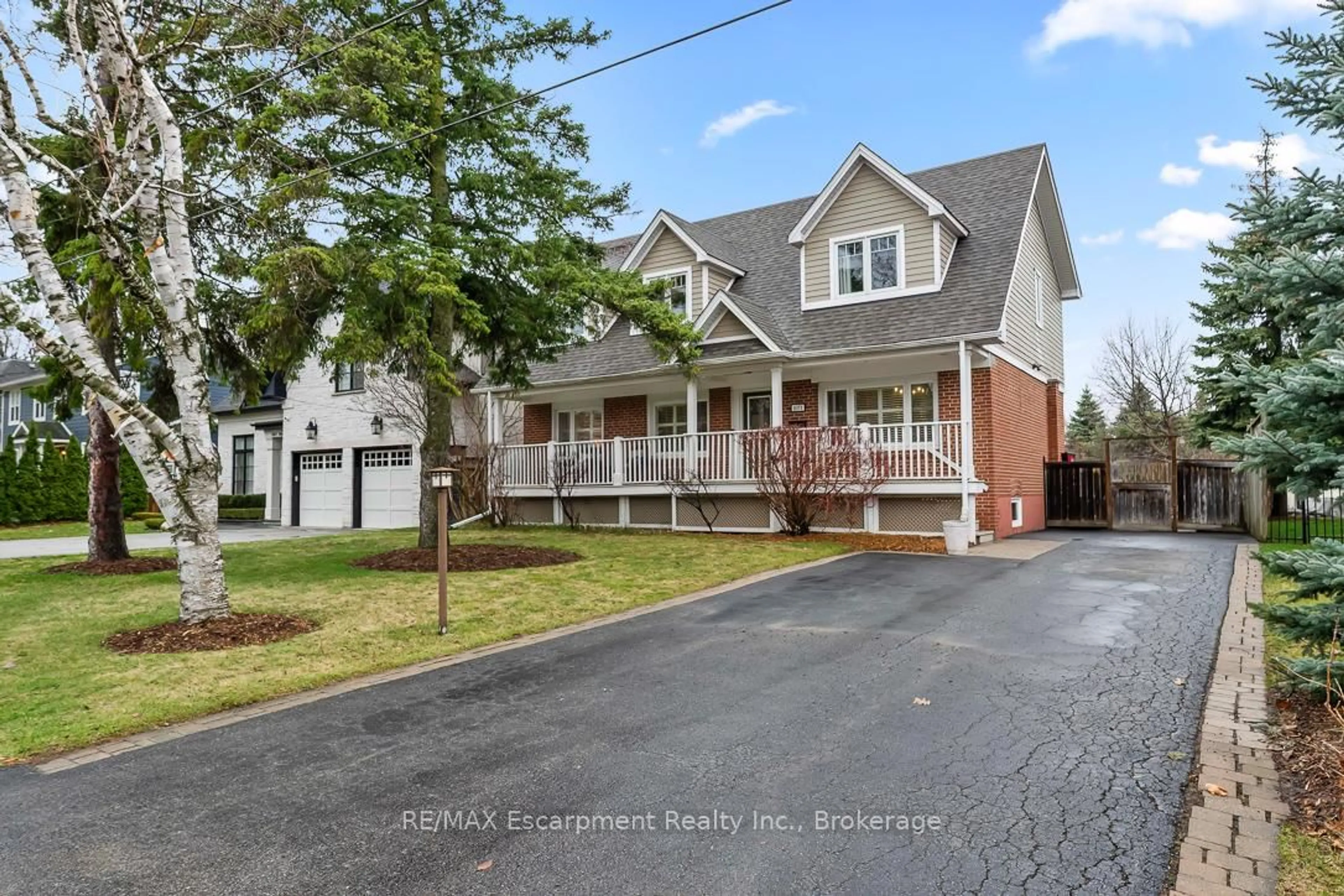 Home with brick exterior material, street for 1071 Melvin Ave, Oakville Ontario L6J 2V8