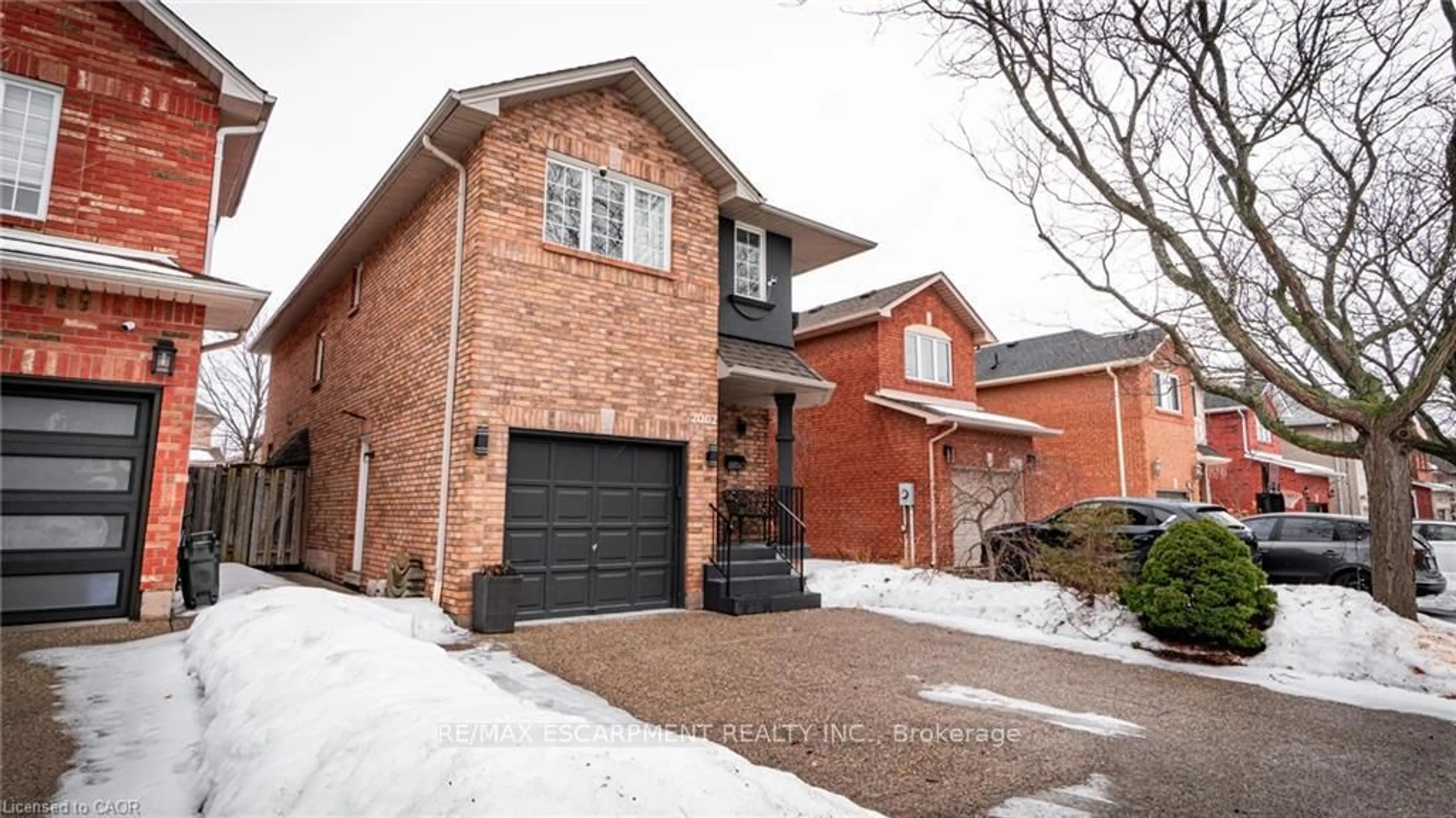 Home with brick exterior material, street for 2062 WESTMOUNT Dr, Oakville Ontario L6M 3P2