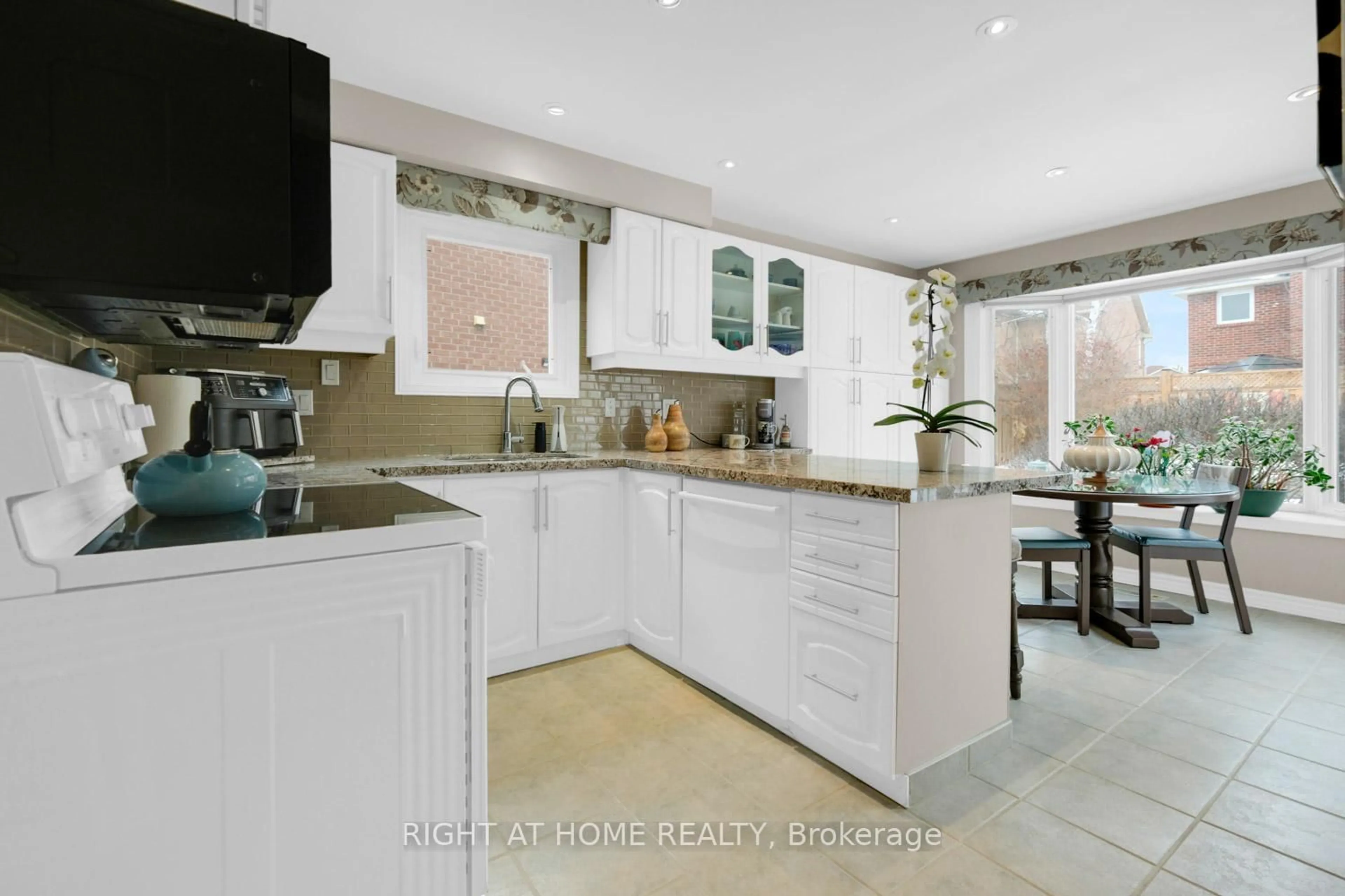 Contemporary kitchen, ceramic/tile floor for 3098 Barwell Rd, Mississauga Ontario L5L 3Z9