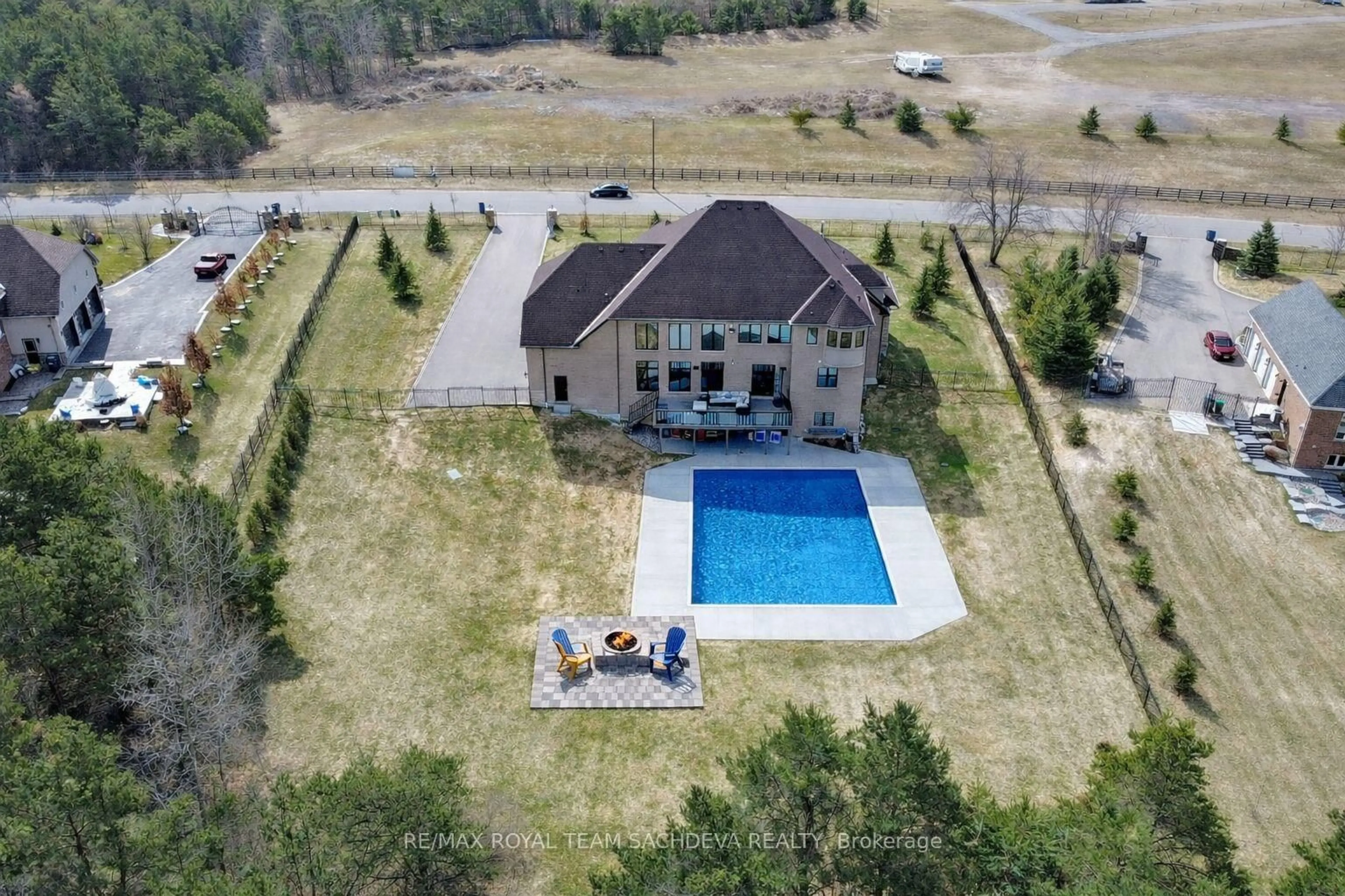 A pic from outside/outdoor area/front of a property/back of a property/a pic from drone, water/lake/river/ocean view for 76 Buckstown Tr, Caledon Ontario L7E 3E8