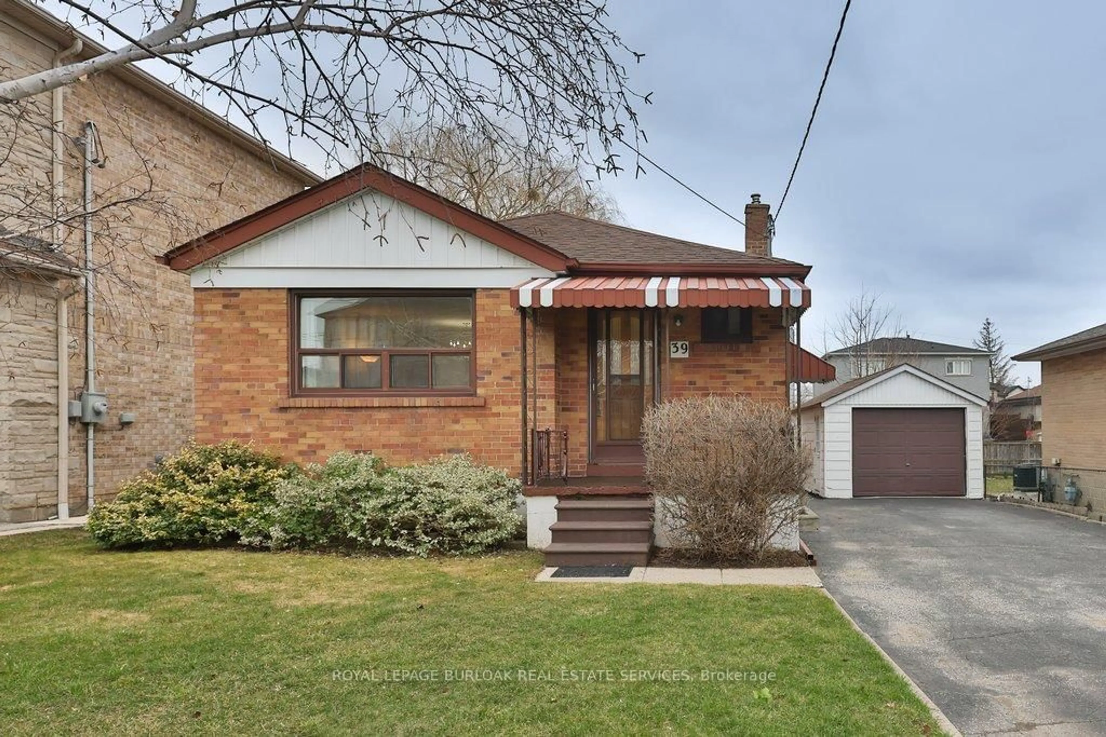 Home with brick exterior material, street for 39 Wickford Dr, Toronto Ontario M6L 1K9