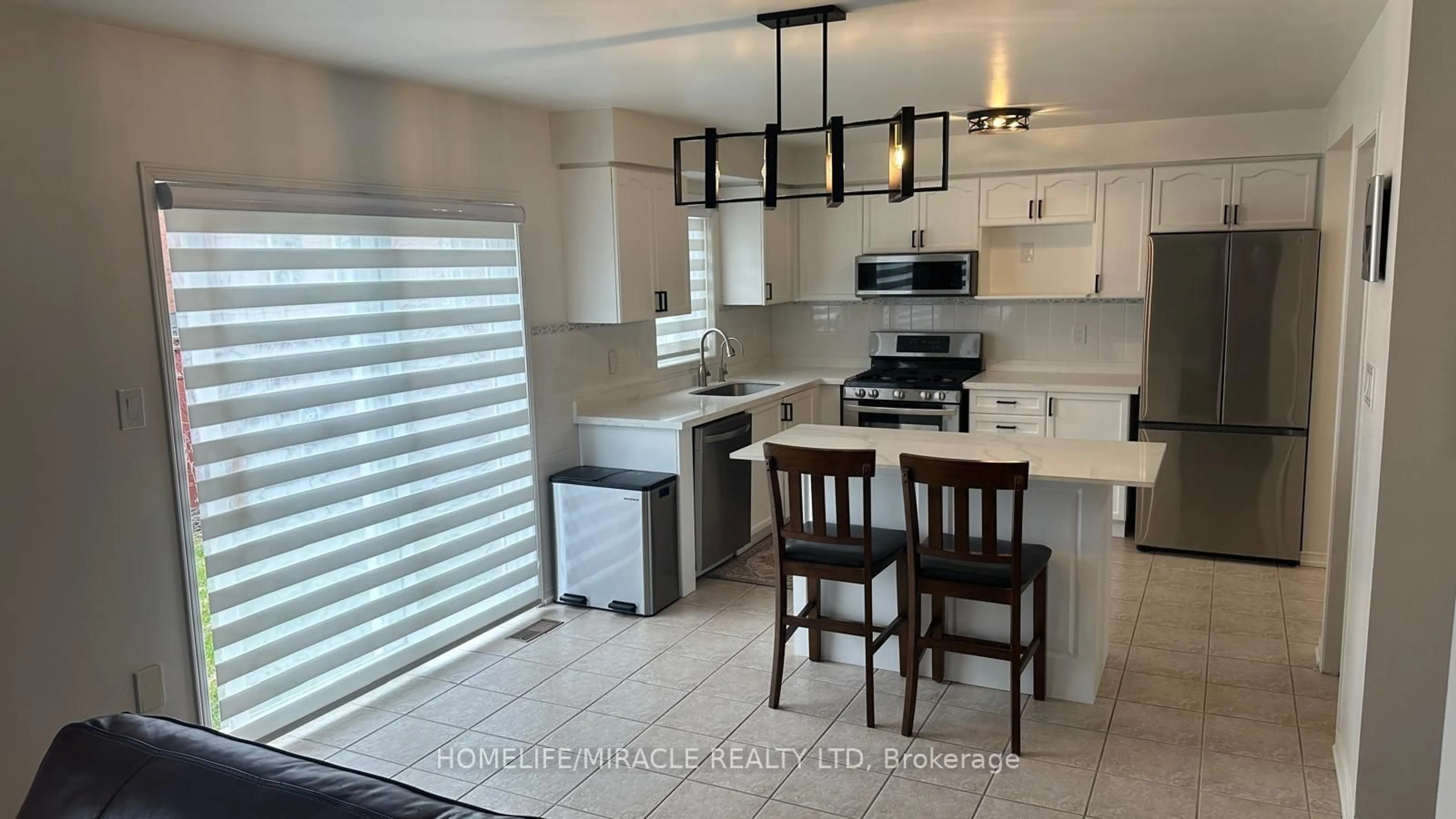 Open concept kitchen, ceramic/tile floor for 65 Fairhill Ave, Brampton Ontario L7A 2E8