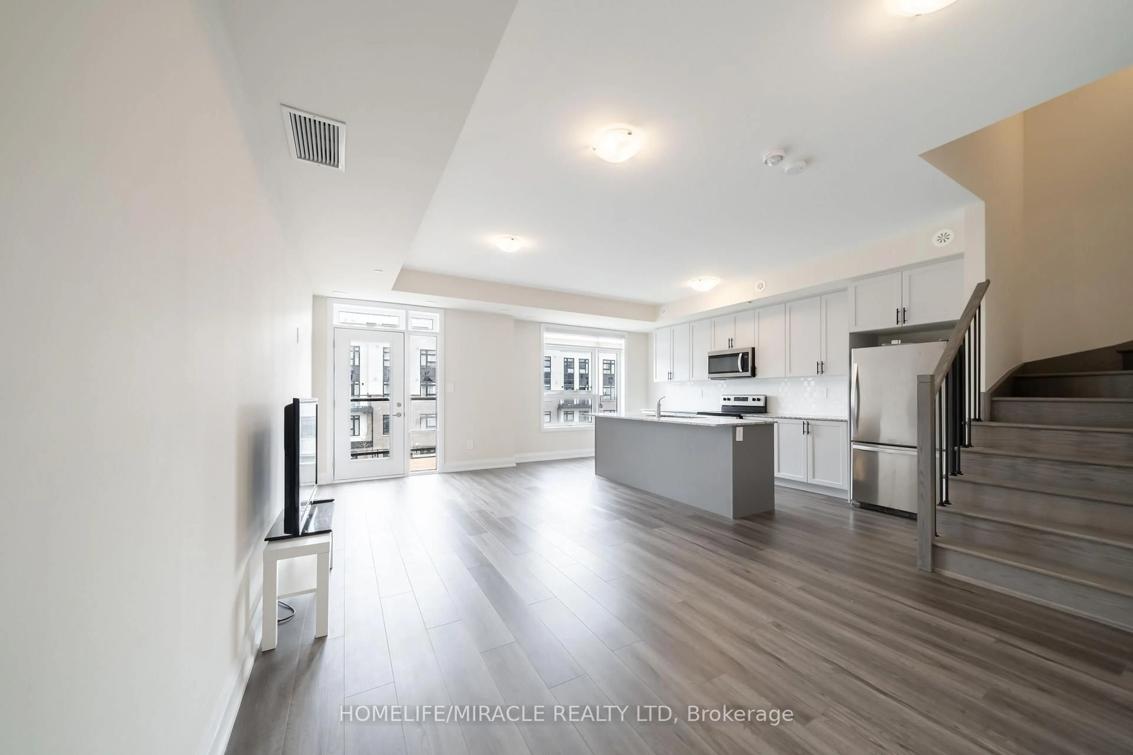 Open concept kitchen, unknown for 1593 Rose Way ##104, Milton Ontario L9E 0J2