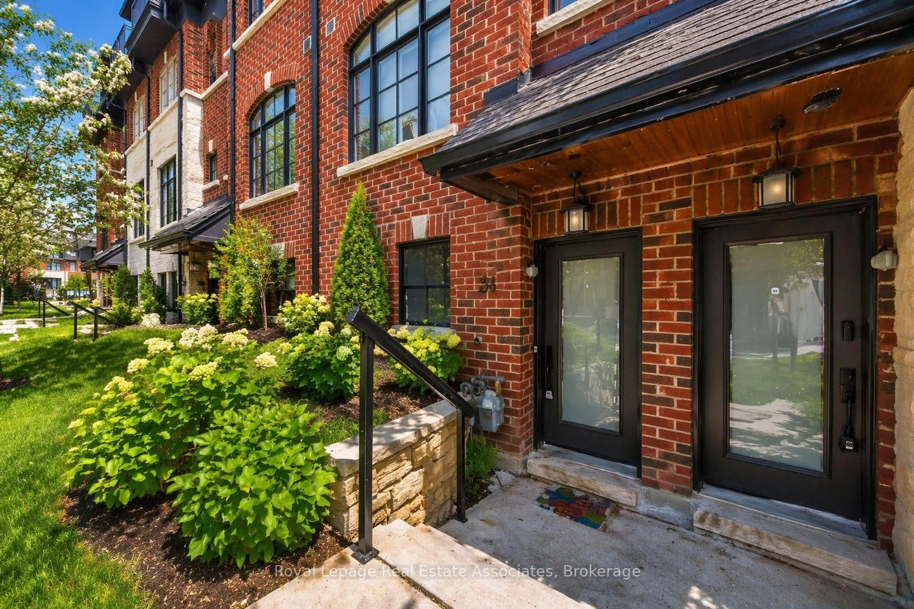 Home with brick exterior material, street for 30 Lunar Cres #56, Mississauga Ontario L5M 2R5