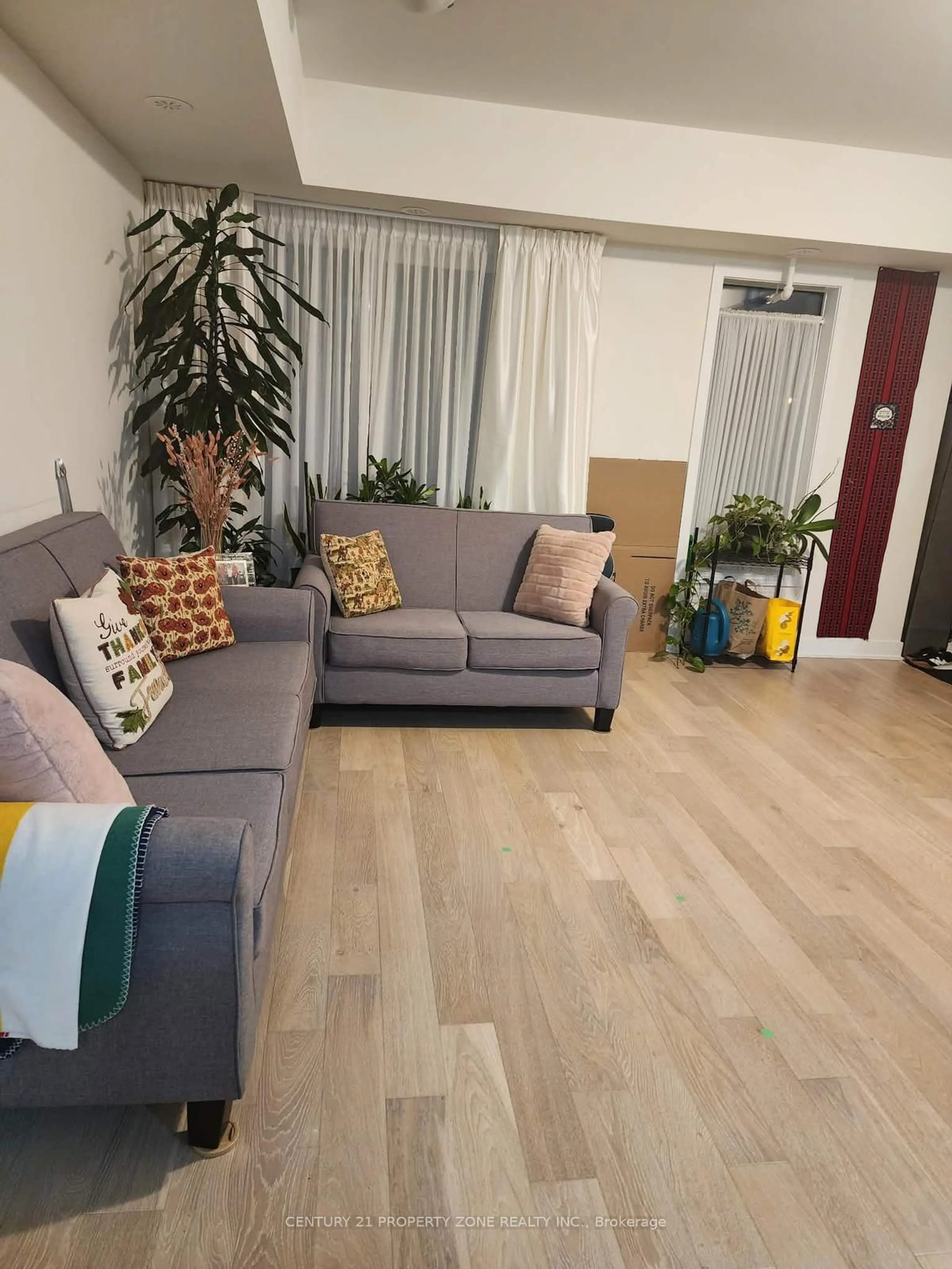 Living room with furniture, unknown for 39 John Perkins Bull Dr #9, Toronto Ontario M3K 0C3