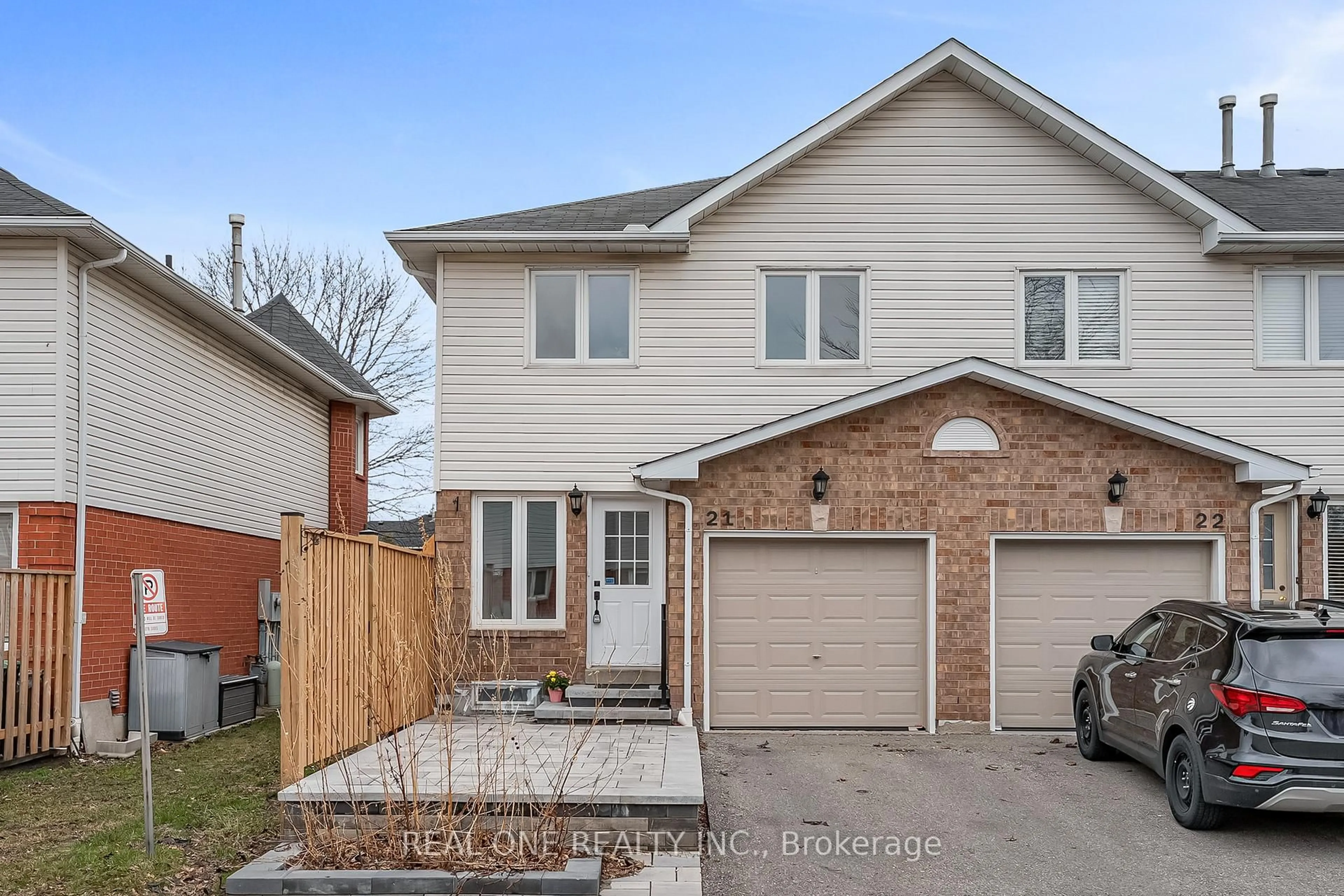 Home with brick exterior material, street for 1485 Torrington Dr #21, Mississauga Ontario L5V 1Y3
