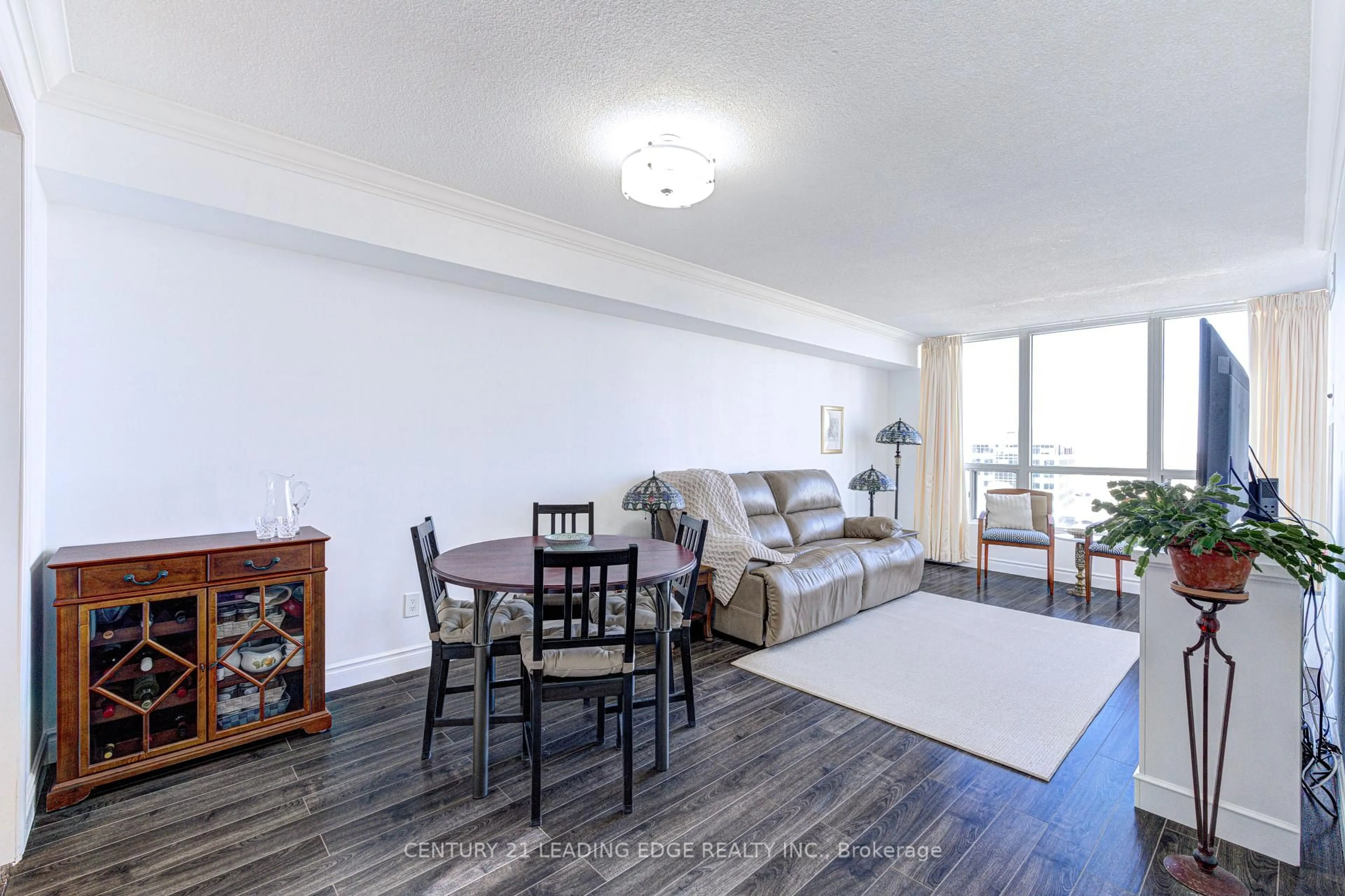 Living room with furniture, wood/laminate floor for 4460 TUCANA Crt #1211, Mississauga Ontario L5R 3K9