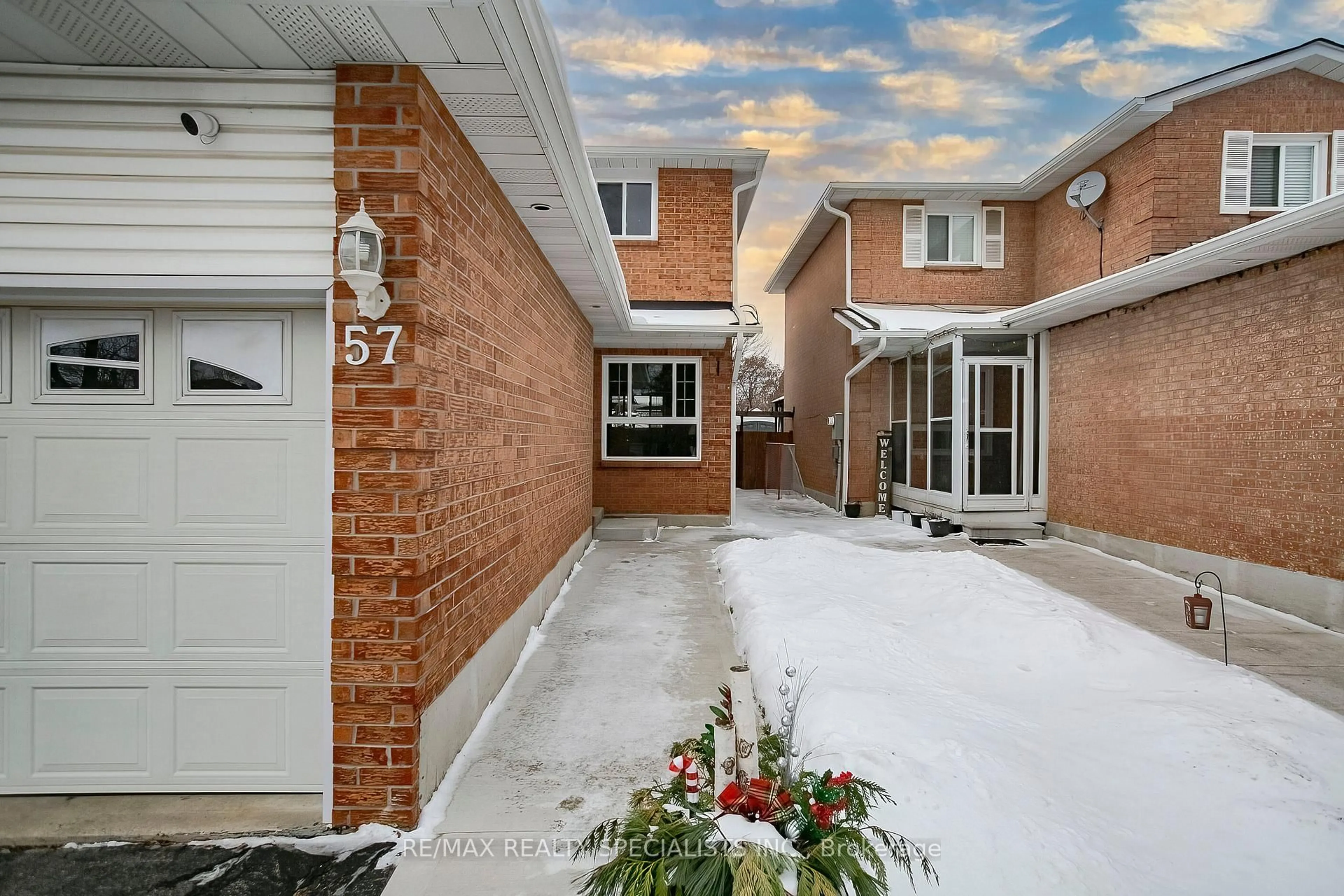 Home with brick exterior material, street for 57 Ecclestone Dr, Brampton Ontario L6X 3N2