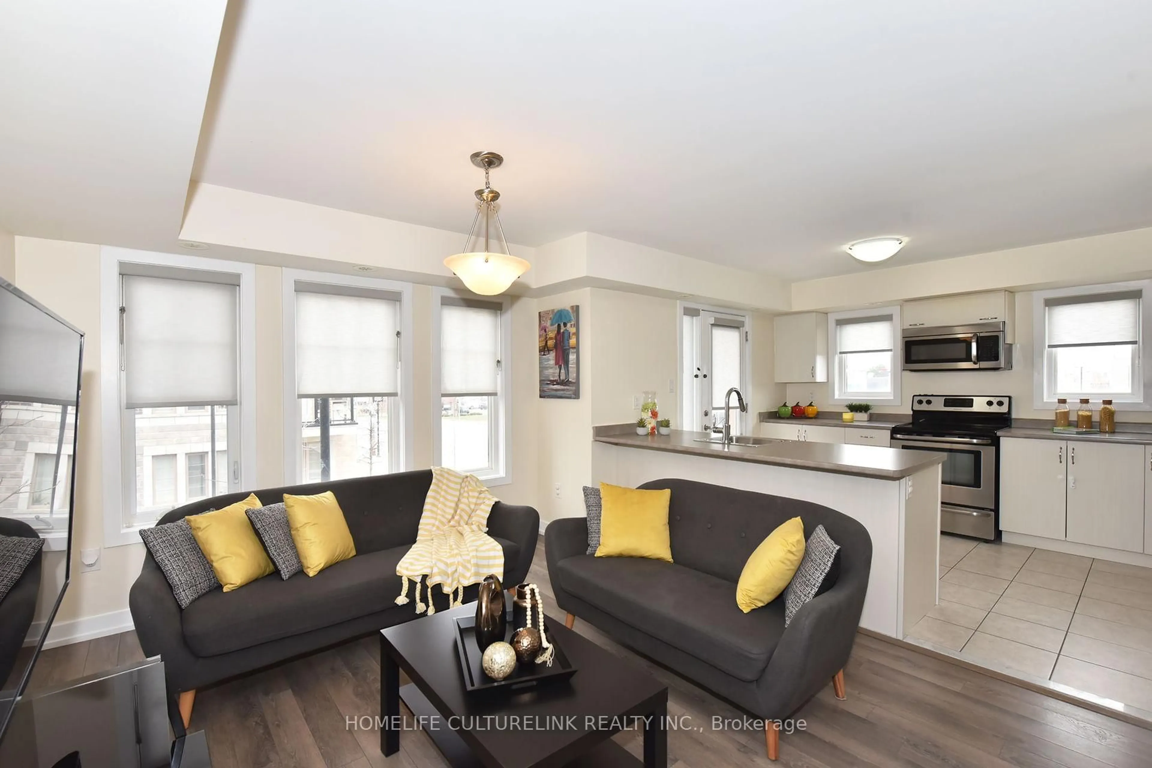 Open concept kitchen, wood/laminate floor for 100 Parrotta Dr #89, Toronto Ontario M9M 0B5