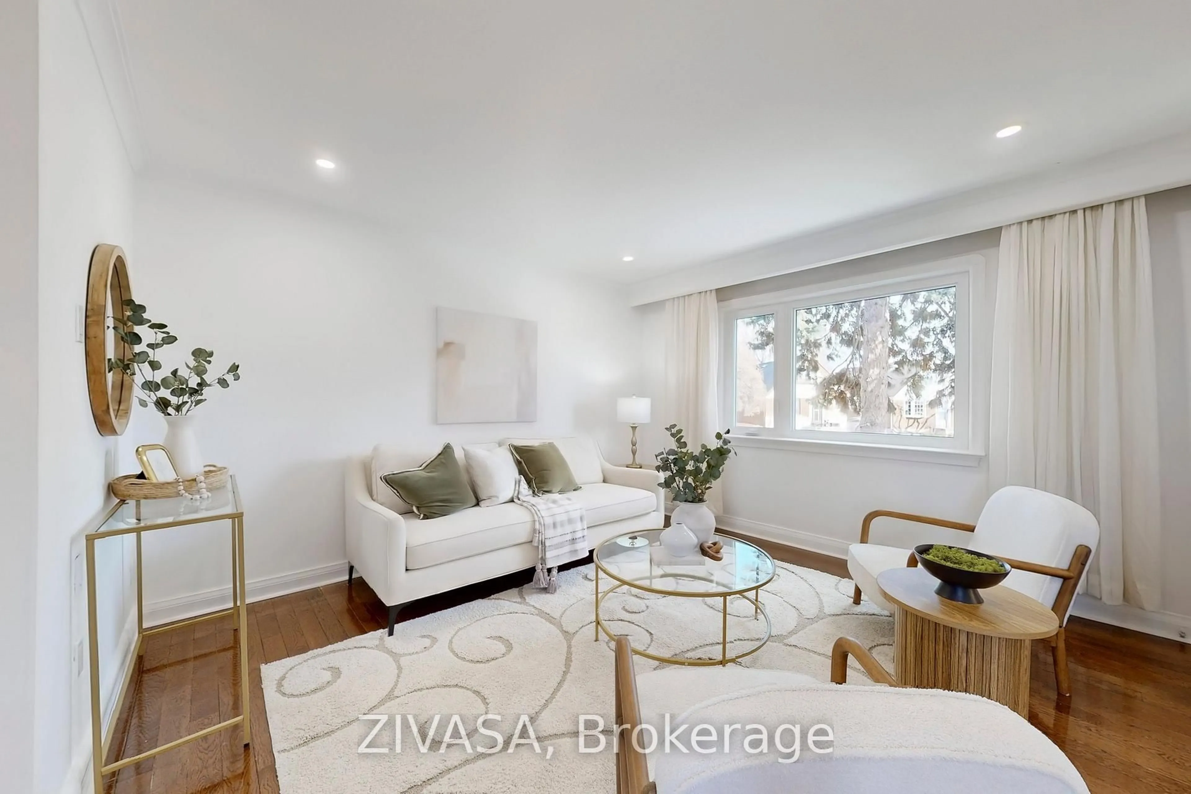 Living room with furniture, wood/laminate floor for 67 Strathnairn Ave, Toronto Ontario M6M 2E9