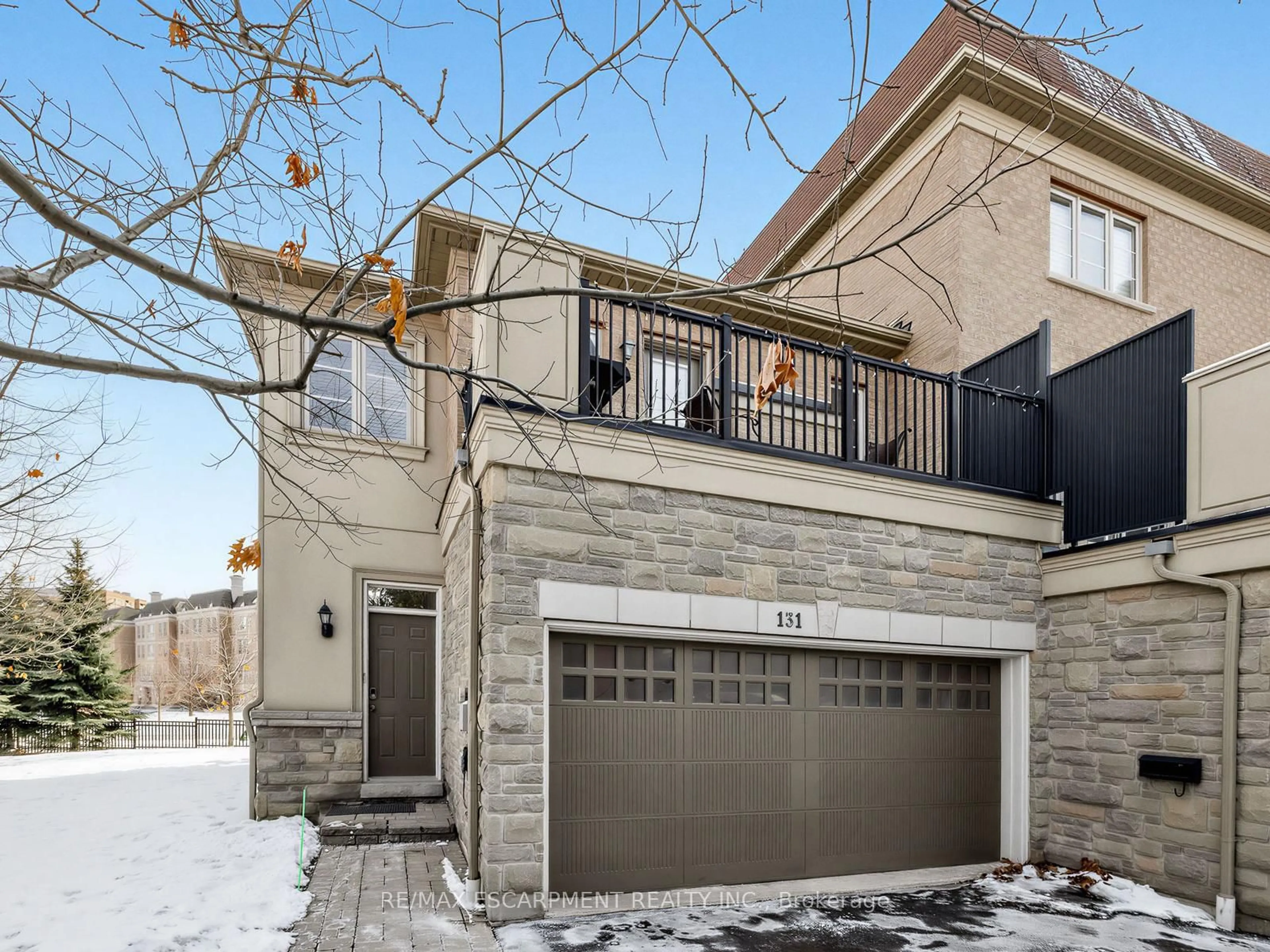 Home with brick exterior material, street for 131 Robert Speck Pkwy, Mississauga Ontario L4Z 0A6
