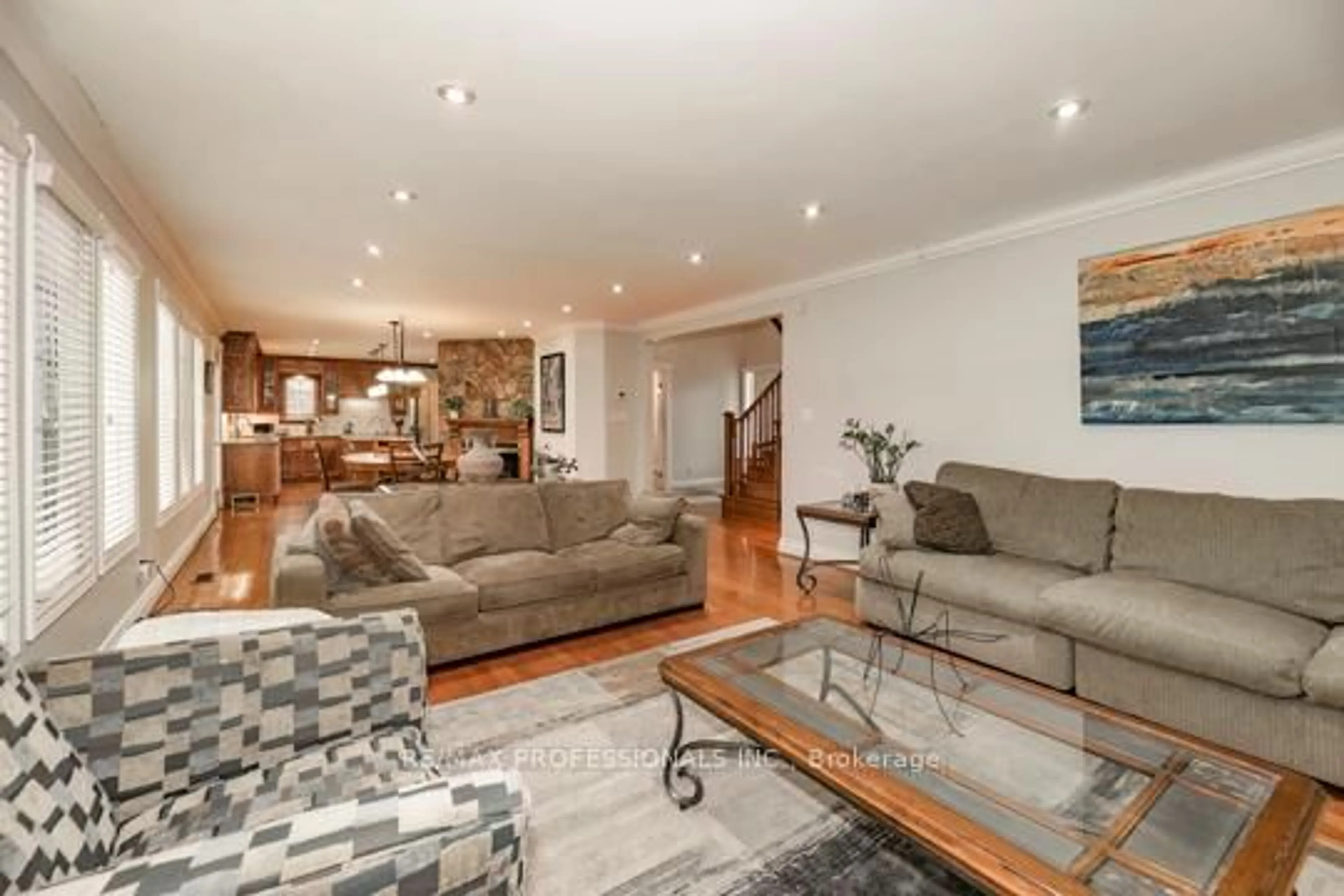 Living room with furniture, wood/laminate floor for 202 Radley Rd, Mississauga Ontario L5G 2R7