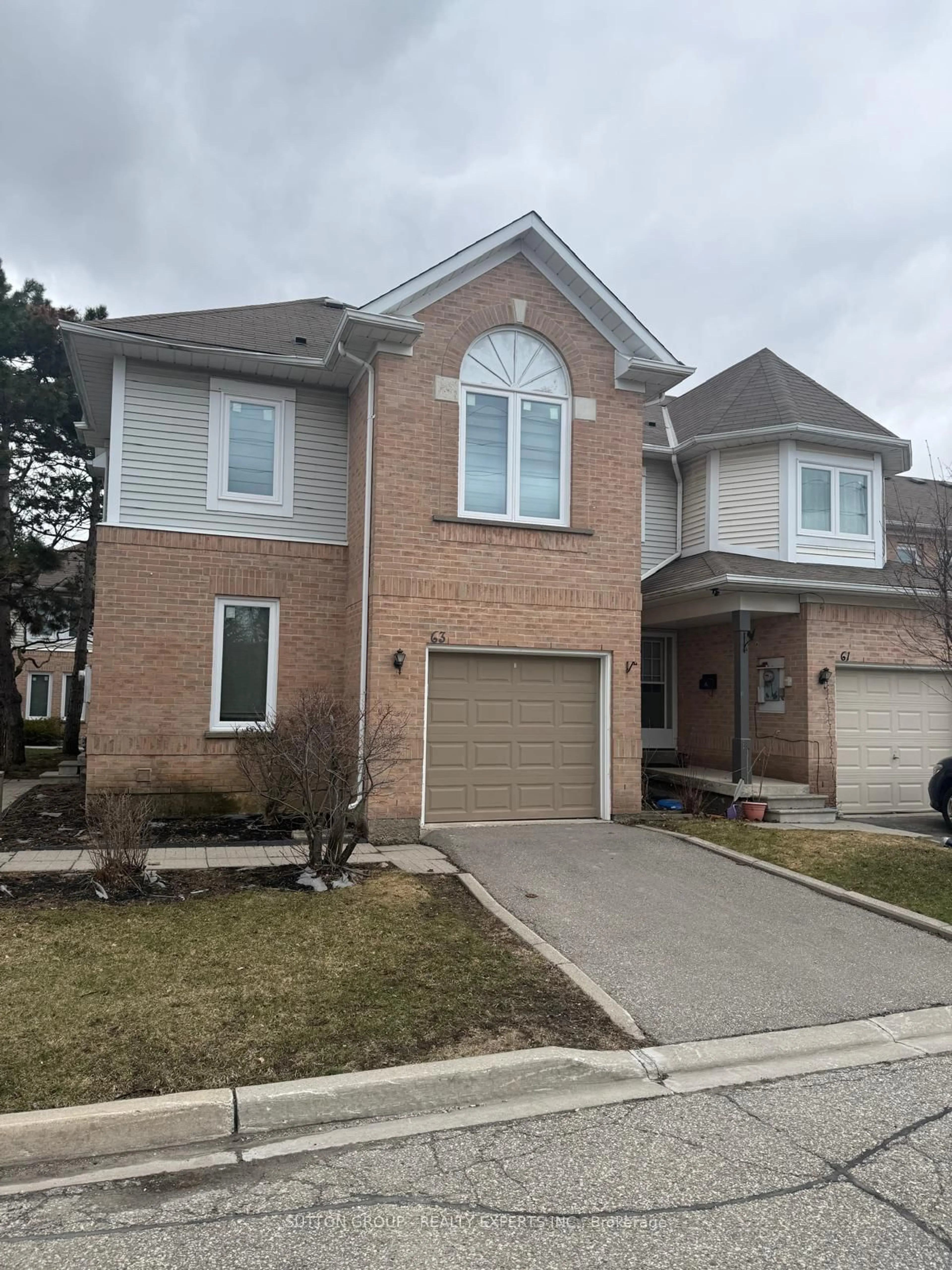 Home with brick exterior material, street for 63 Wickstead Crt, Brampton Ontario L6R 1N8