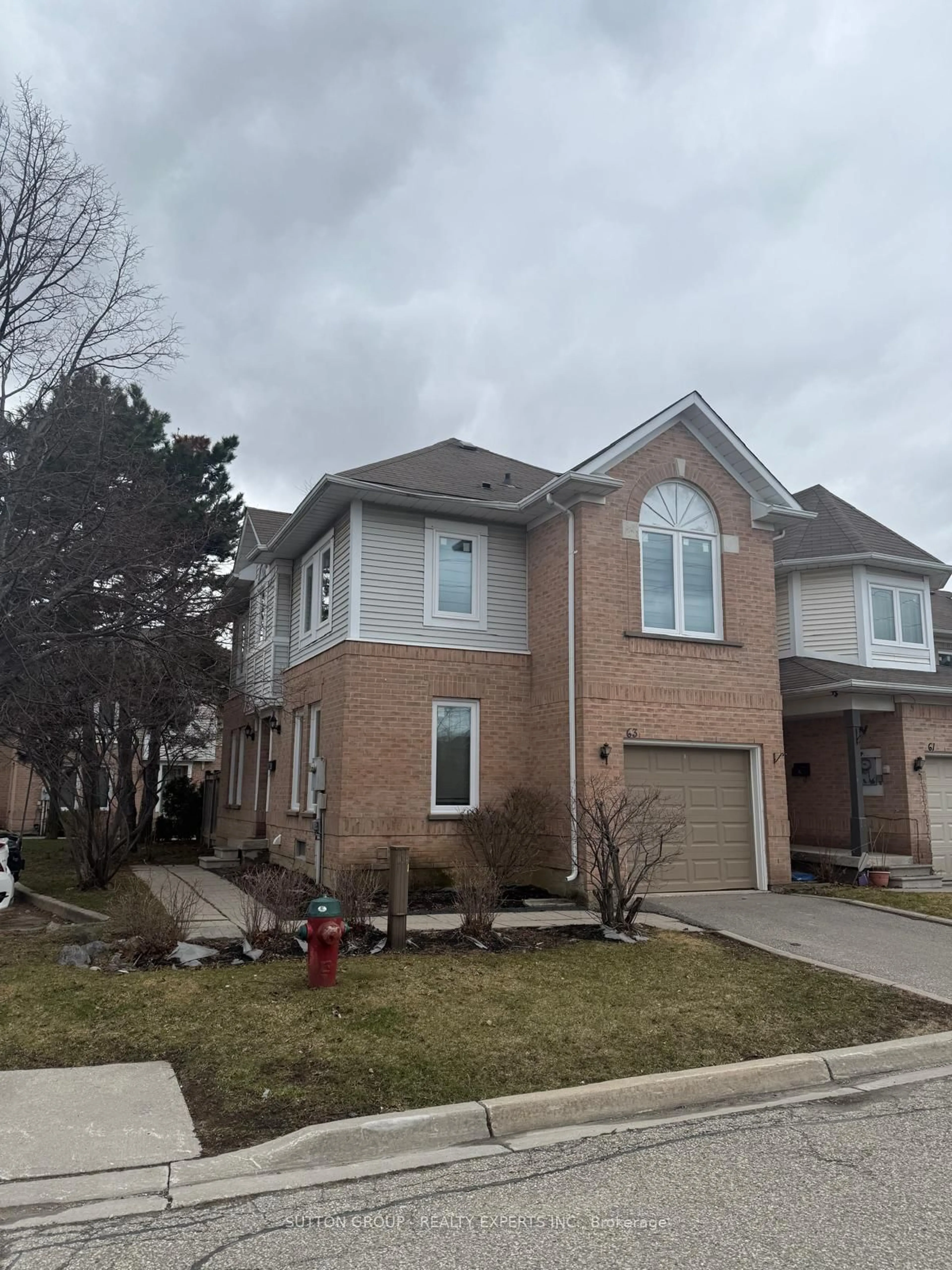 Home with brick exterior material, street for 63 Wickstead Crt, Brampton Ontario L6R 1N8