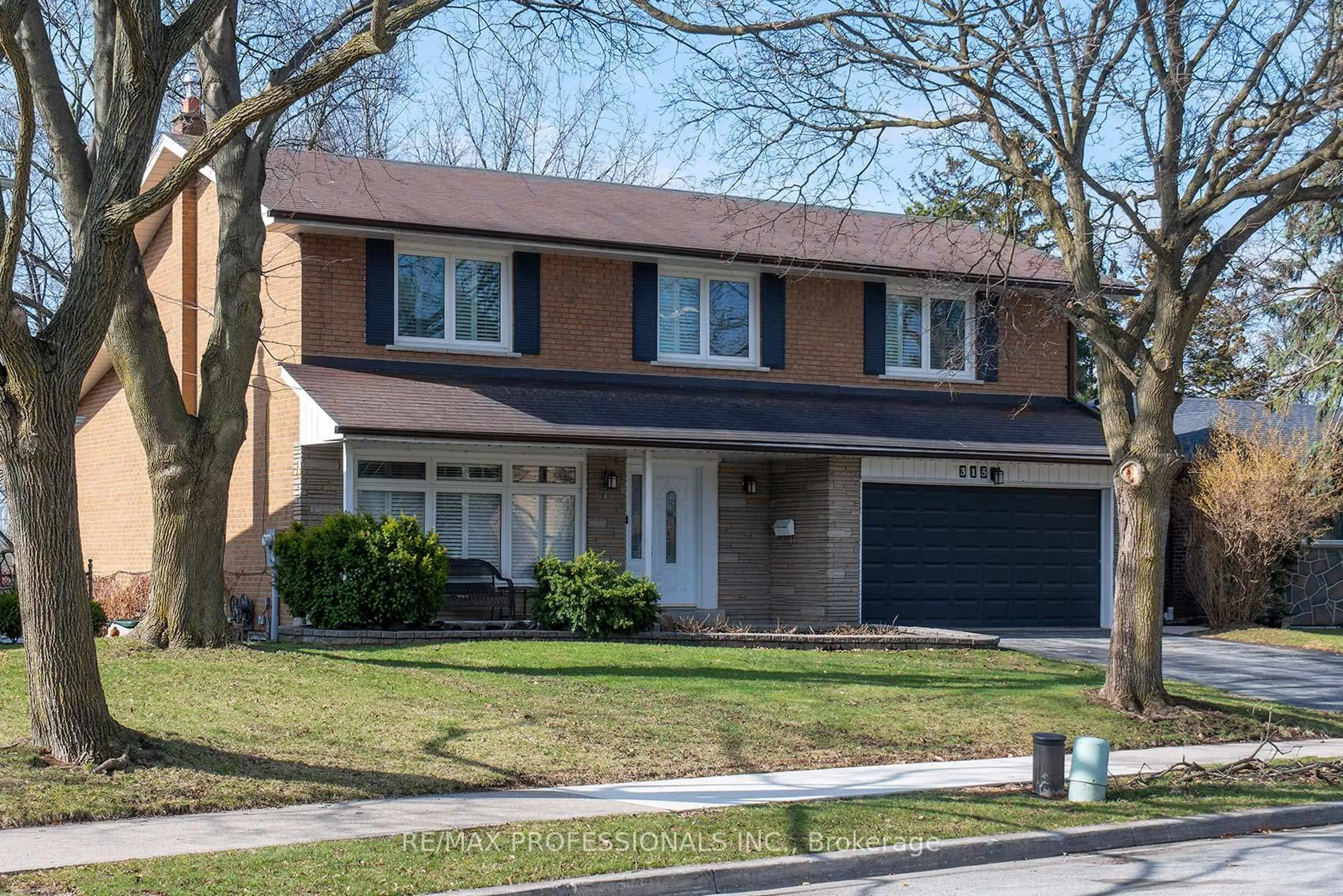 Home with brick exterior material, street for 315 Markland Dr, Toronto Ontario M9C 1R4