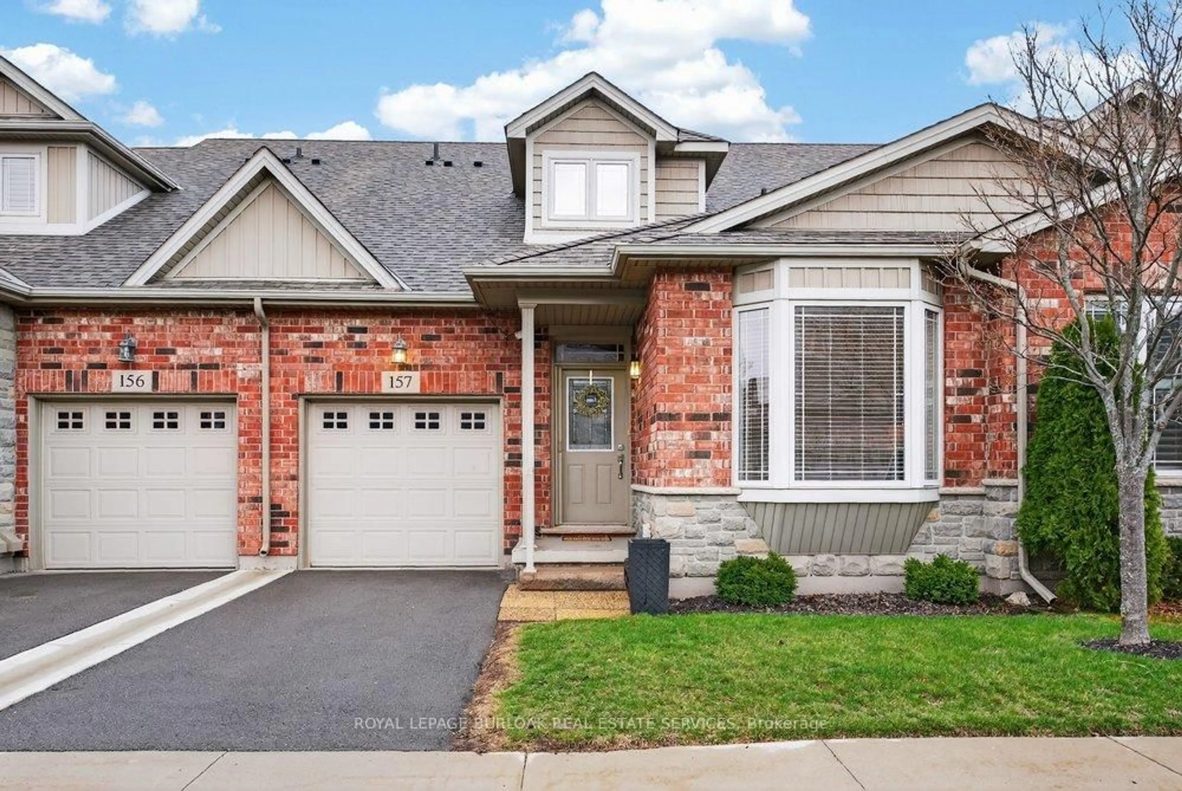 Home with brick exterior material, street for 2120 Itabashi Way #157, Burlington Ontario L7M 0V3