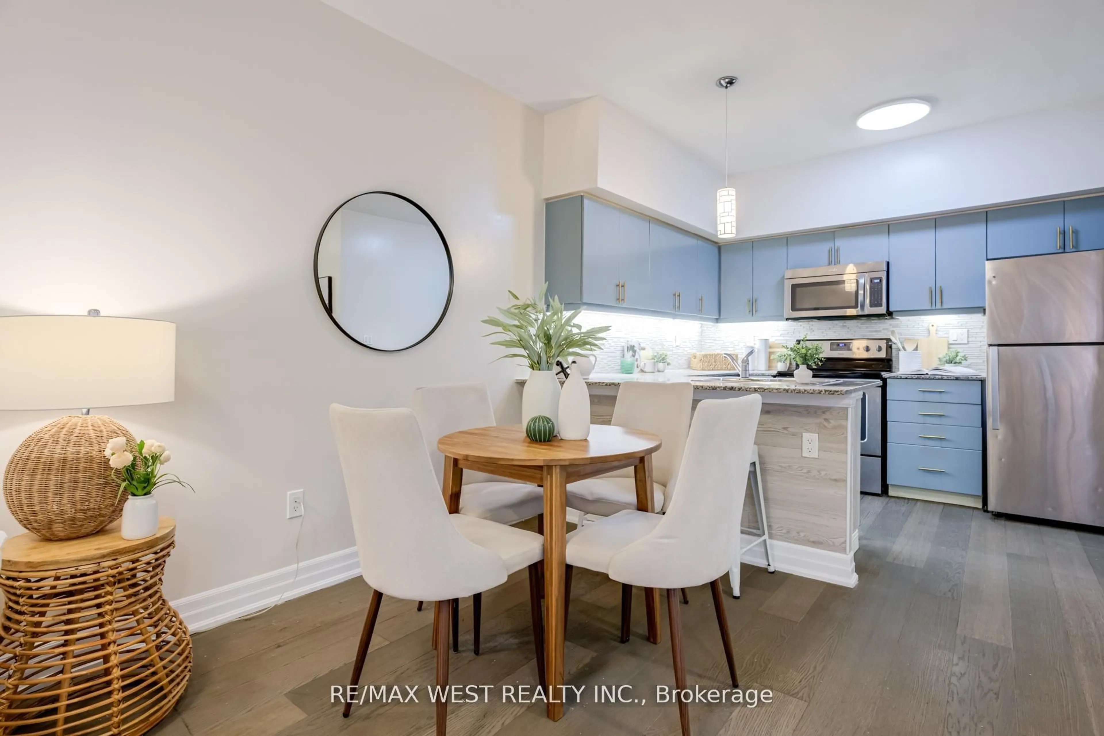 Open concept kitchen, wood/laminate floor for 45 Sousa Mendes St #101, Toronto Ontario M6P 0A7