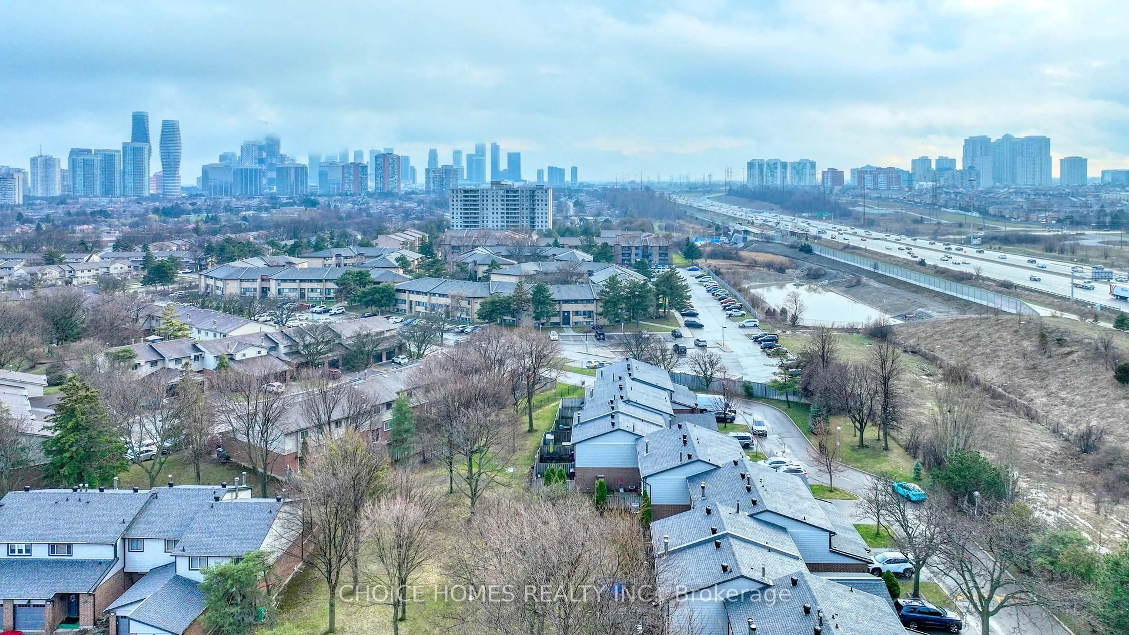 A pic from outside/outdoor area/front of a property/back of a property/a pic from drone, city buildings view from balcony for 525 Meadows Blvd #73, Mississauga Ontario L4Z 1H2