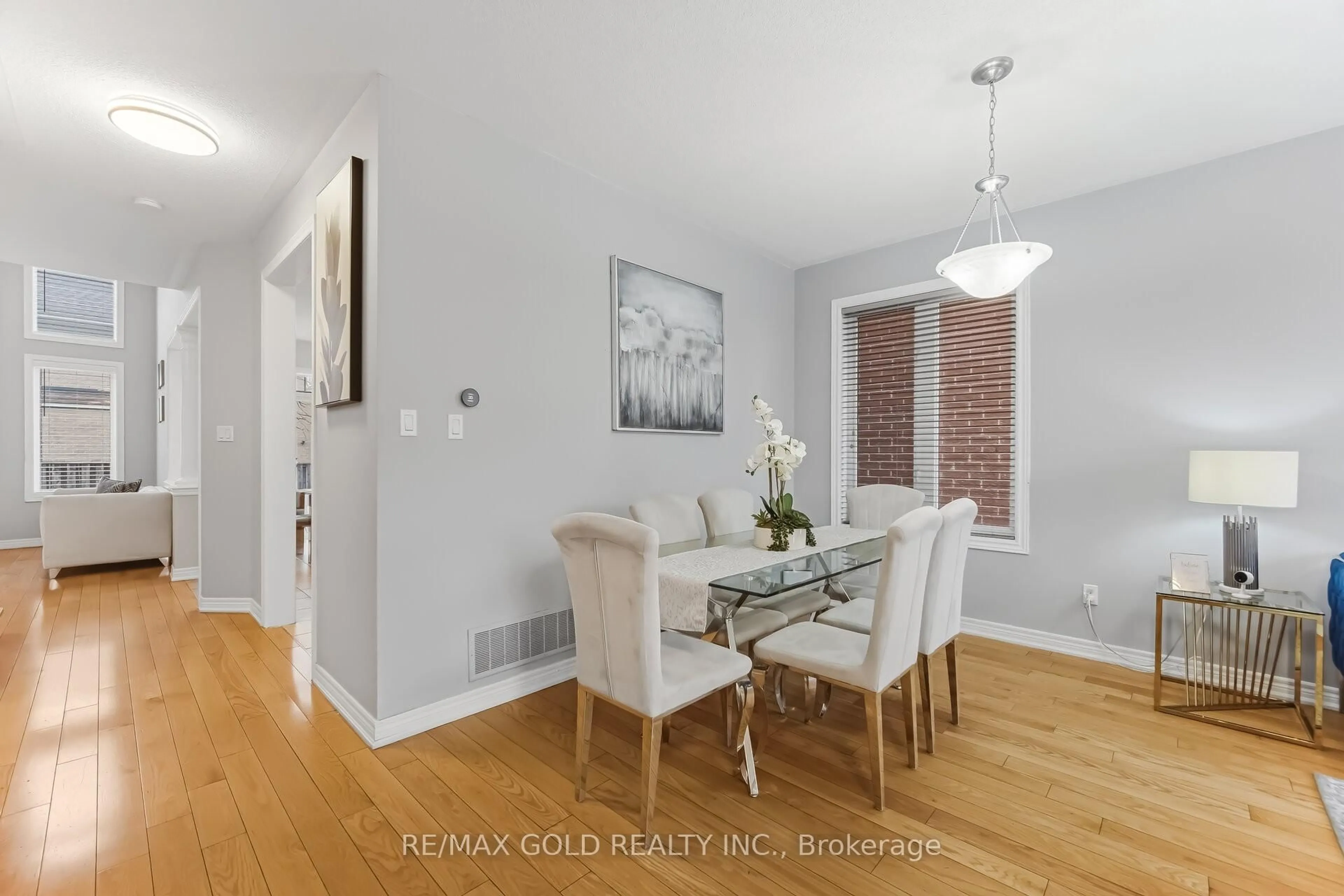 Dining room, wood/laminate floor for 152 Father Tobin Rd, Brampton Ontario L6R 0E3