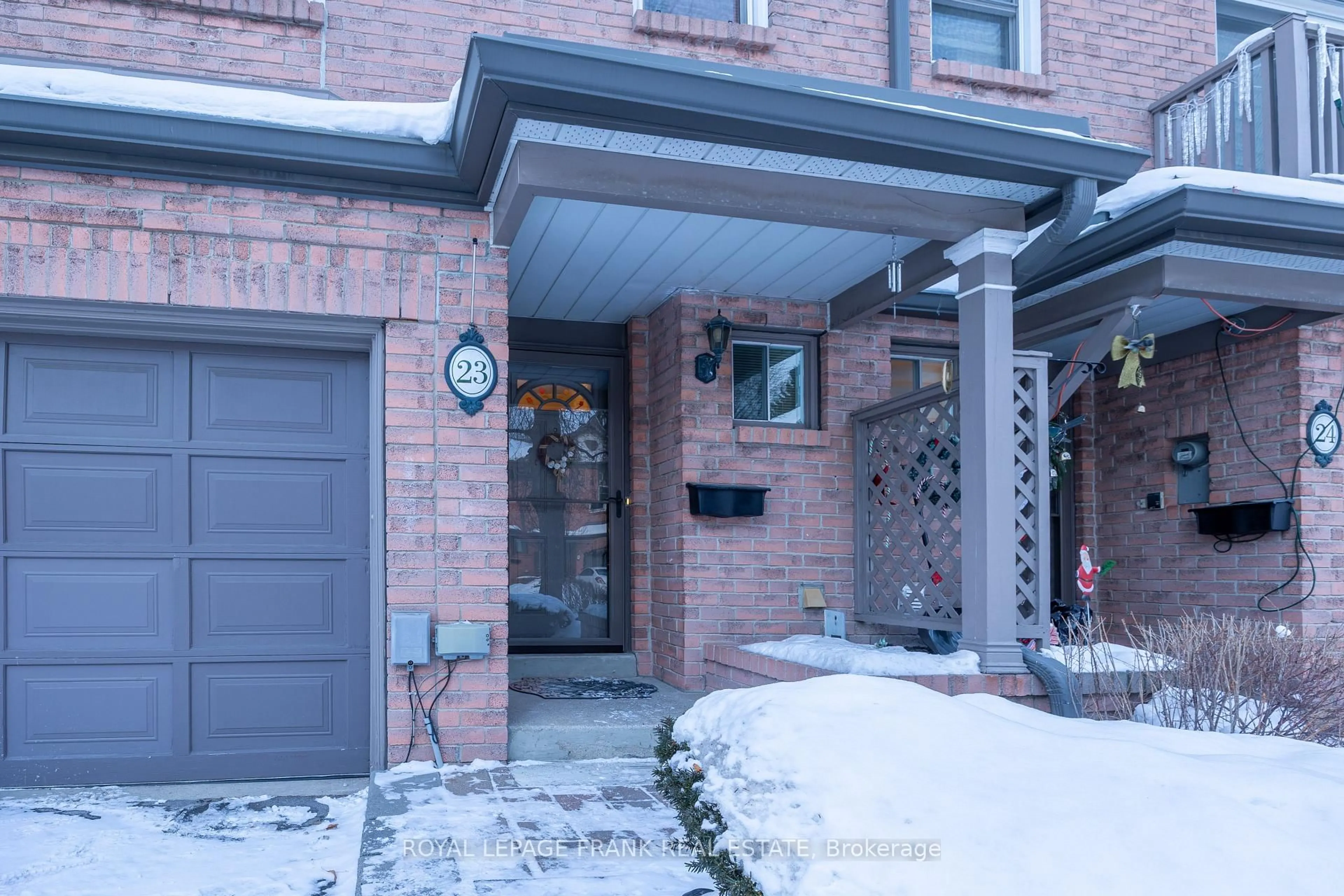 Home with brick exterior material, street for 385 THE EAST MALL #23, Toronto Ontario M9B 6C6