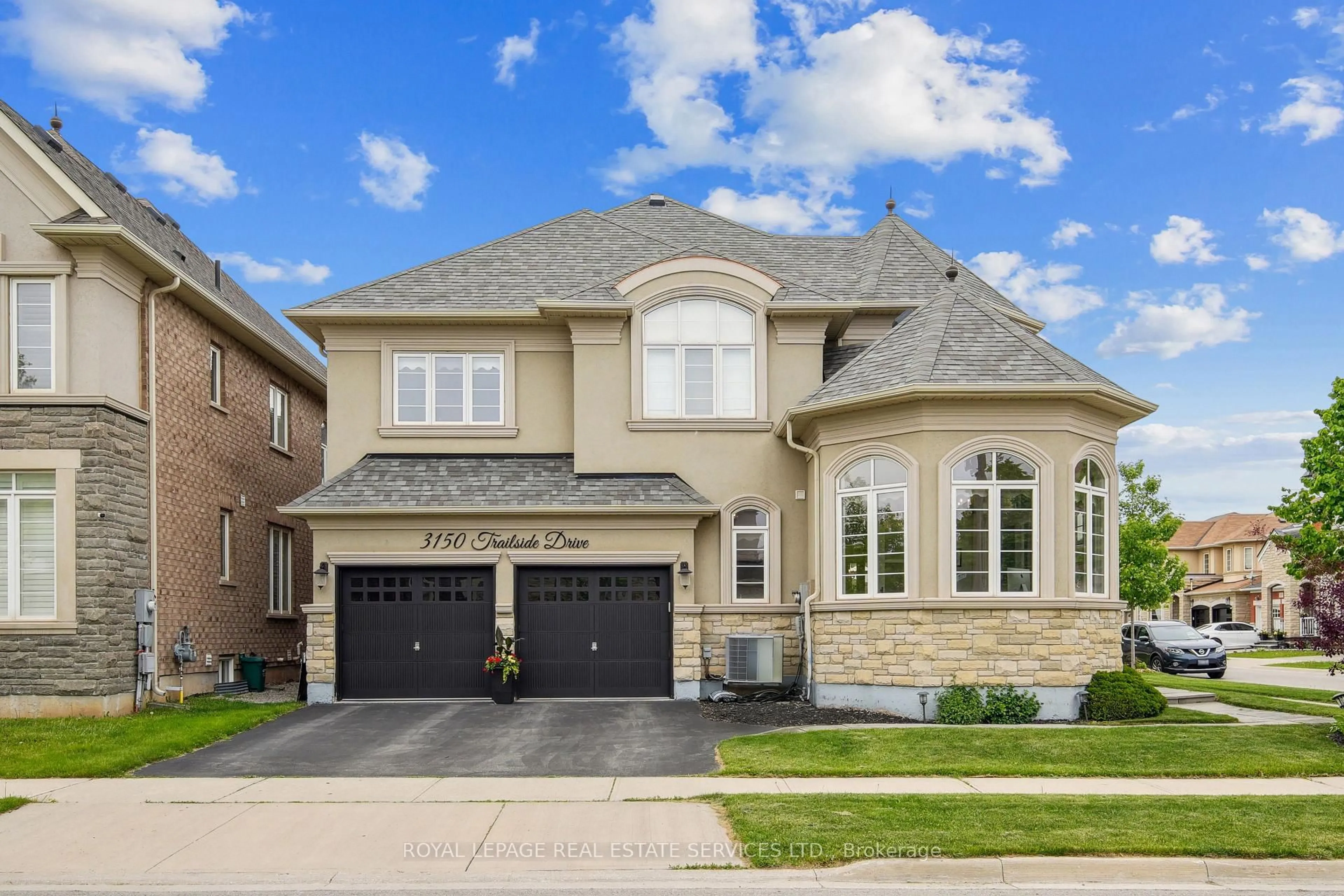 Home with brick exterior material, street for 3150 Trailside Dr, Oakville Ontario L6M 0P6