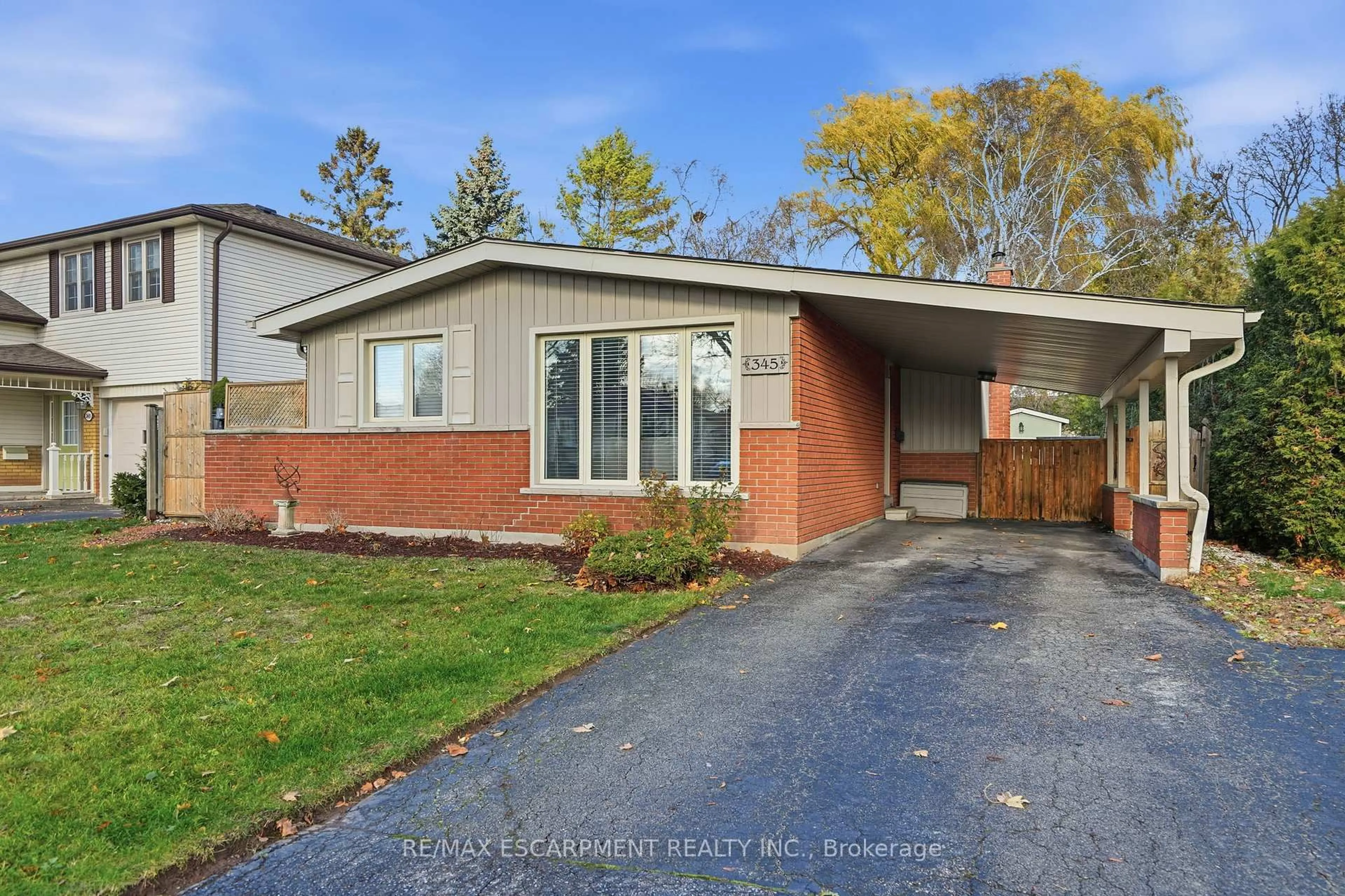 Home with brick exterior material, street for 345 Erindale Dr, Burlington Ontario L7L 4T3