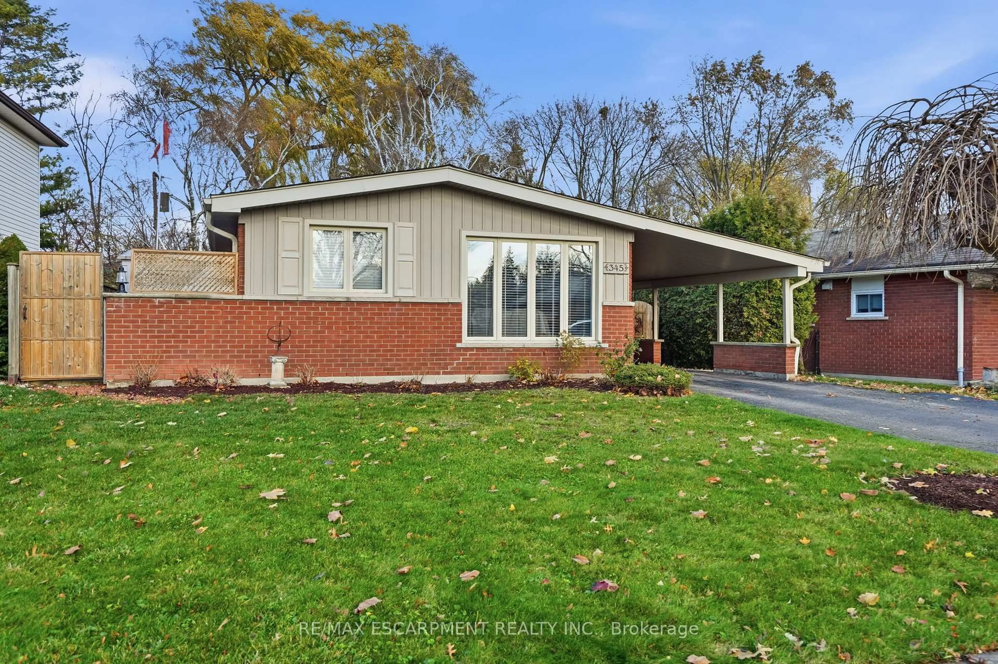 Home with brick exterior material, street for 345 Erindale Dr, Burlington Ontario L7L 4T3