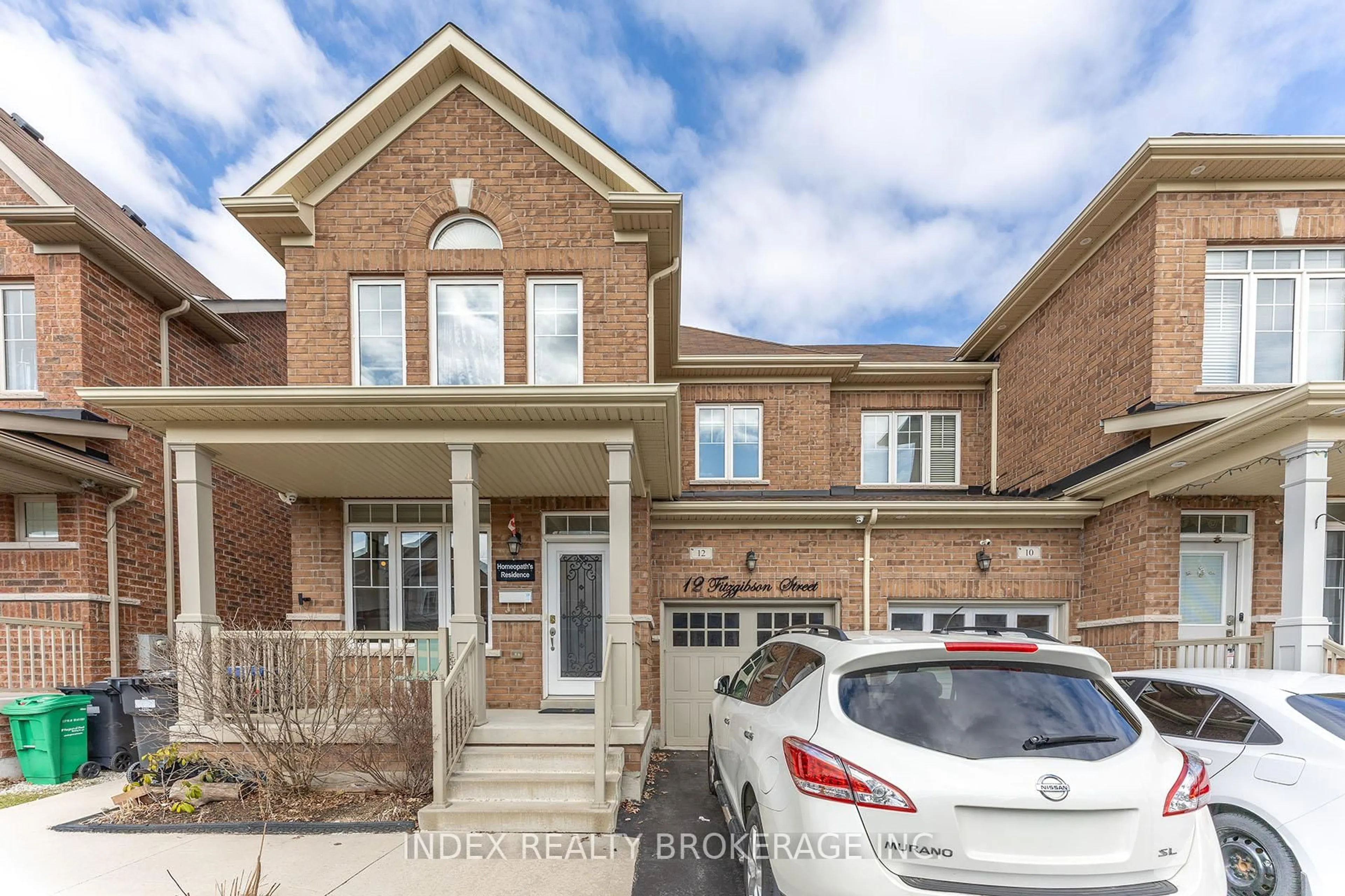 Home with brick exterior material, street for 12 Fitzgibson St, Brampton Ontario L6Y 5Y5