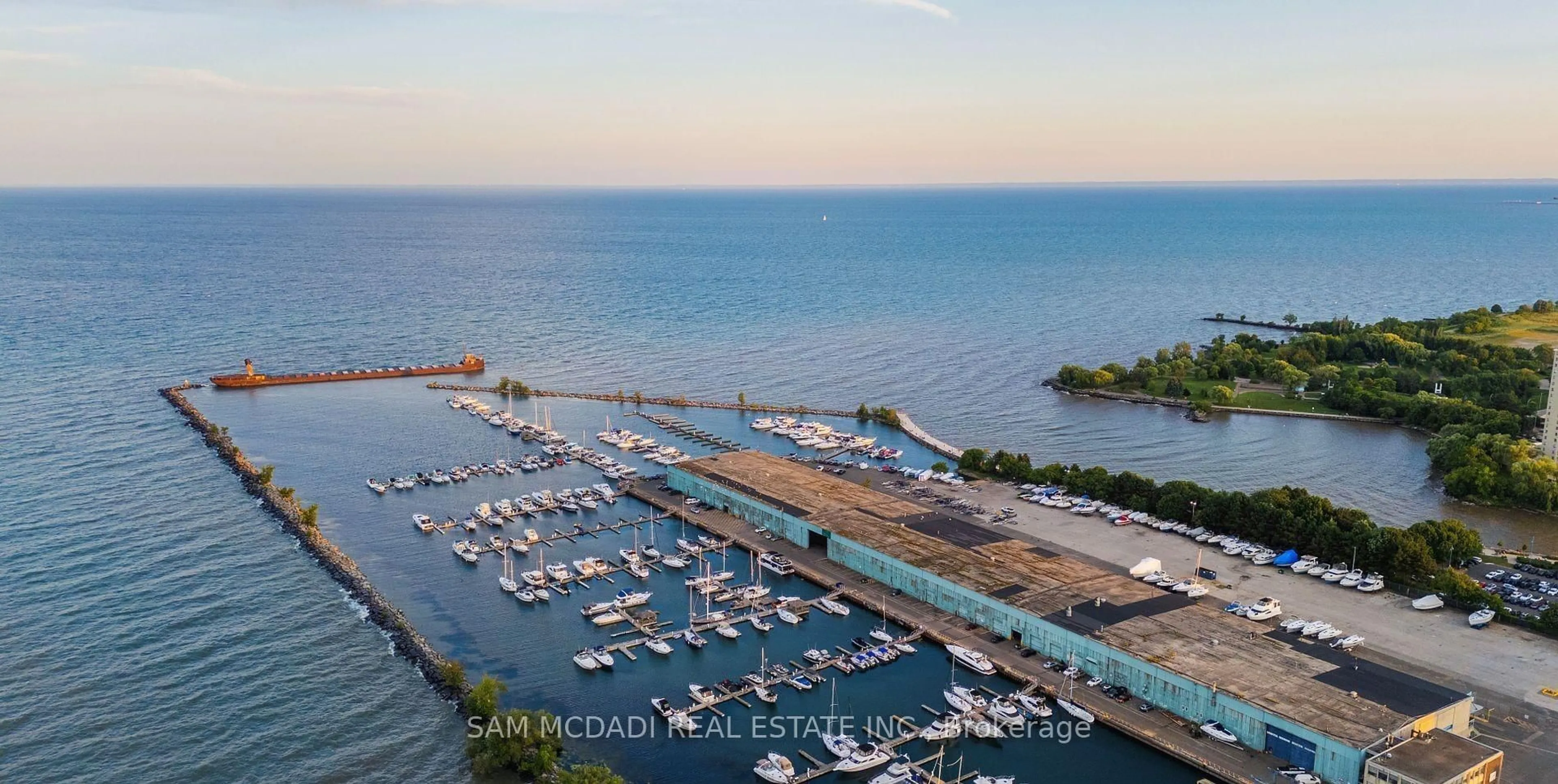 A pic from outside/outdoor area/front of a property/back of a property/a pic from drone, water/lake/river/ocean view for 28 Ann St #301, Mississauga Ontario L5G 0E1