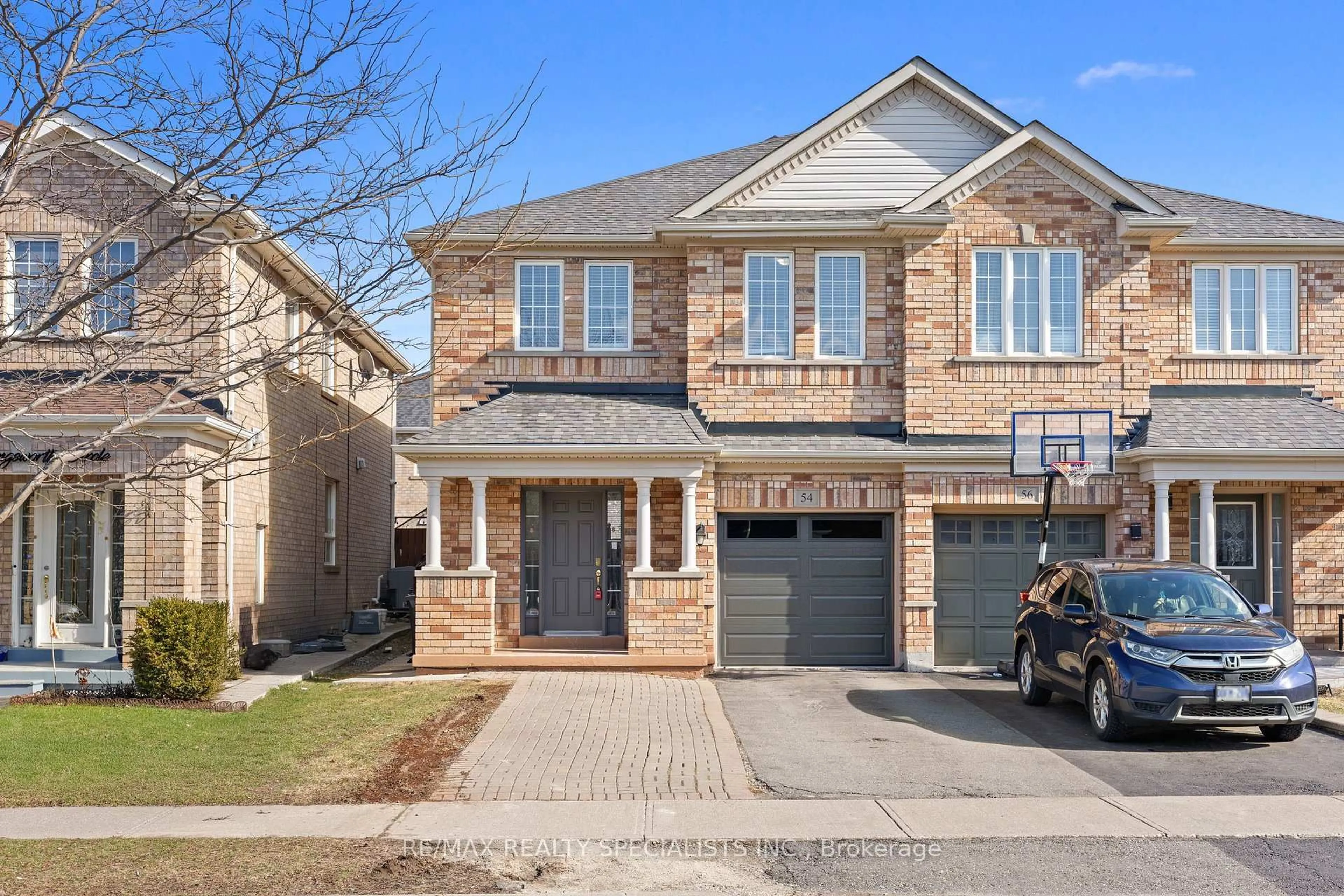 Home with brick exterior material, street for 54 Hollingsworth Circ, Brampton Ontario L7A 0J4