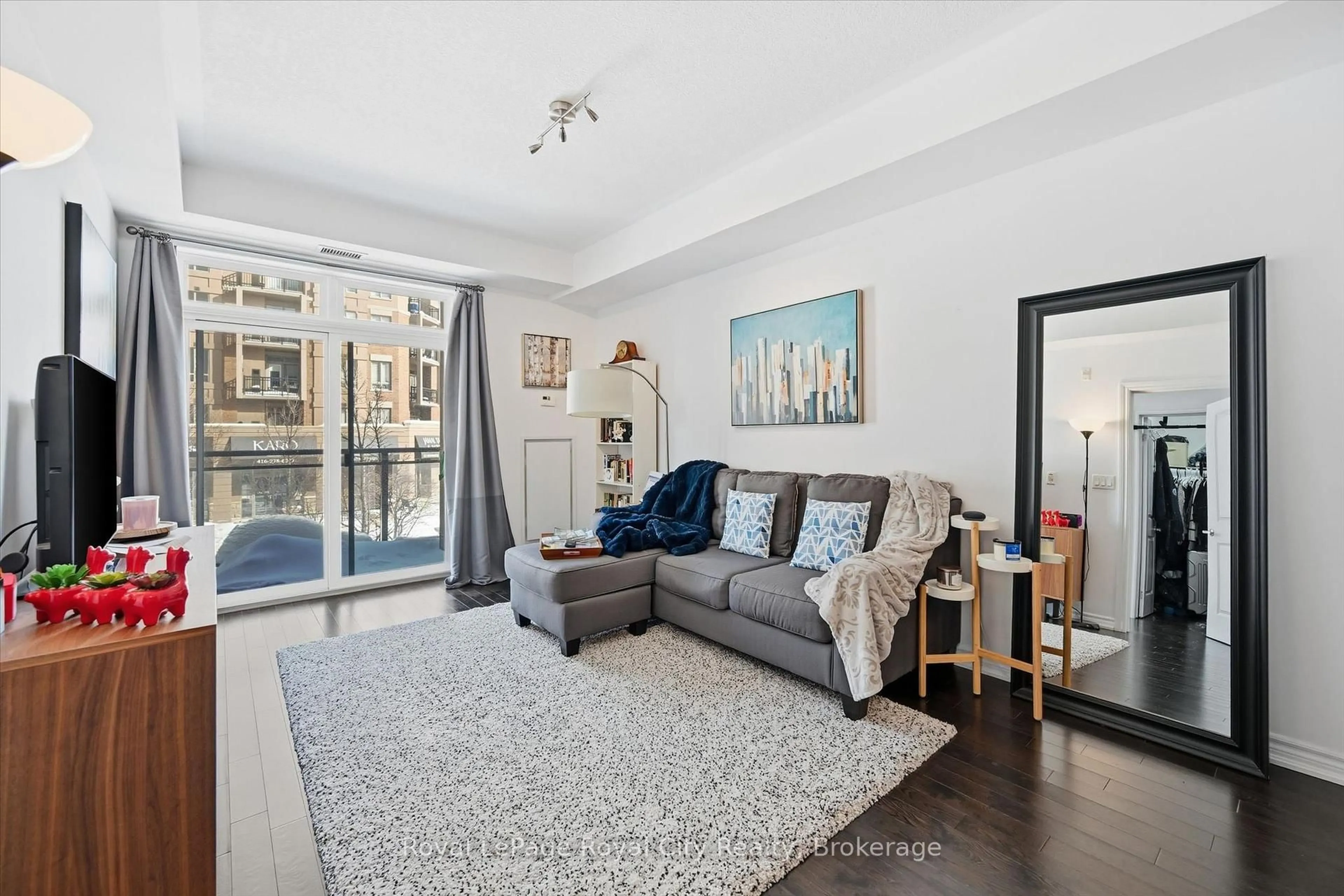 Living room with furniture, unknown for 5317 Upper Middle Rd #221, Burlington Ontario L7L 0G8