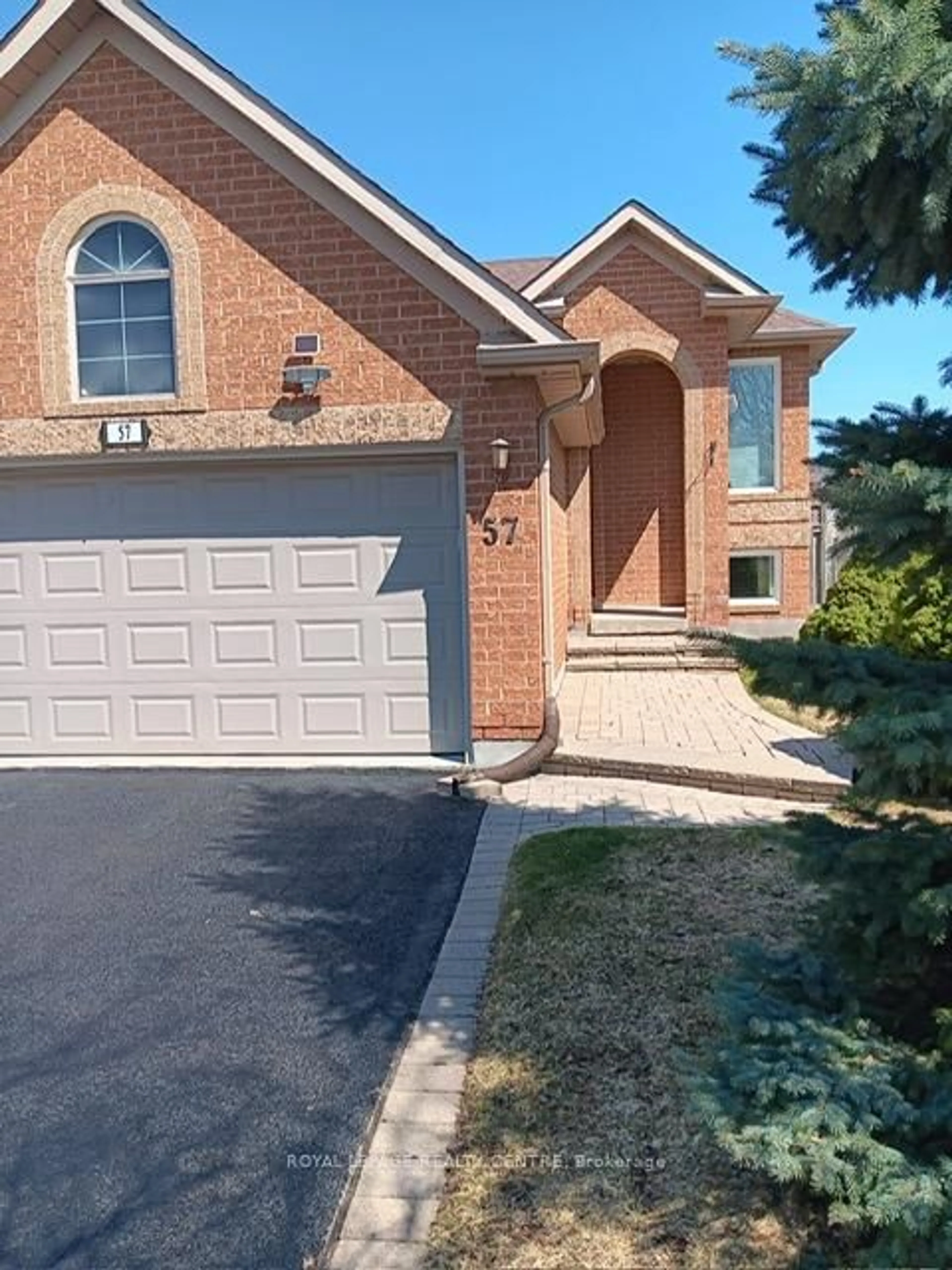 Home with brick exterior material, street for 57 Royal Orchard Dr, Brampton Ontario L6X 4M5