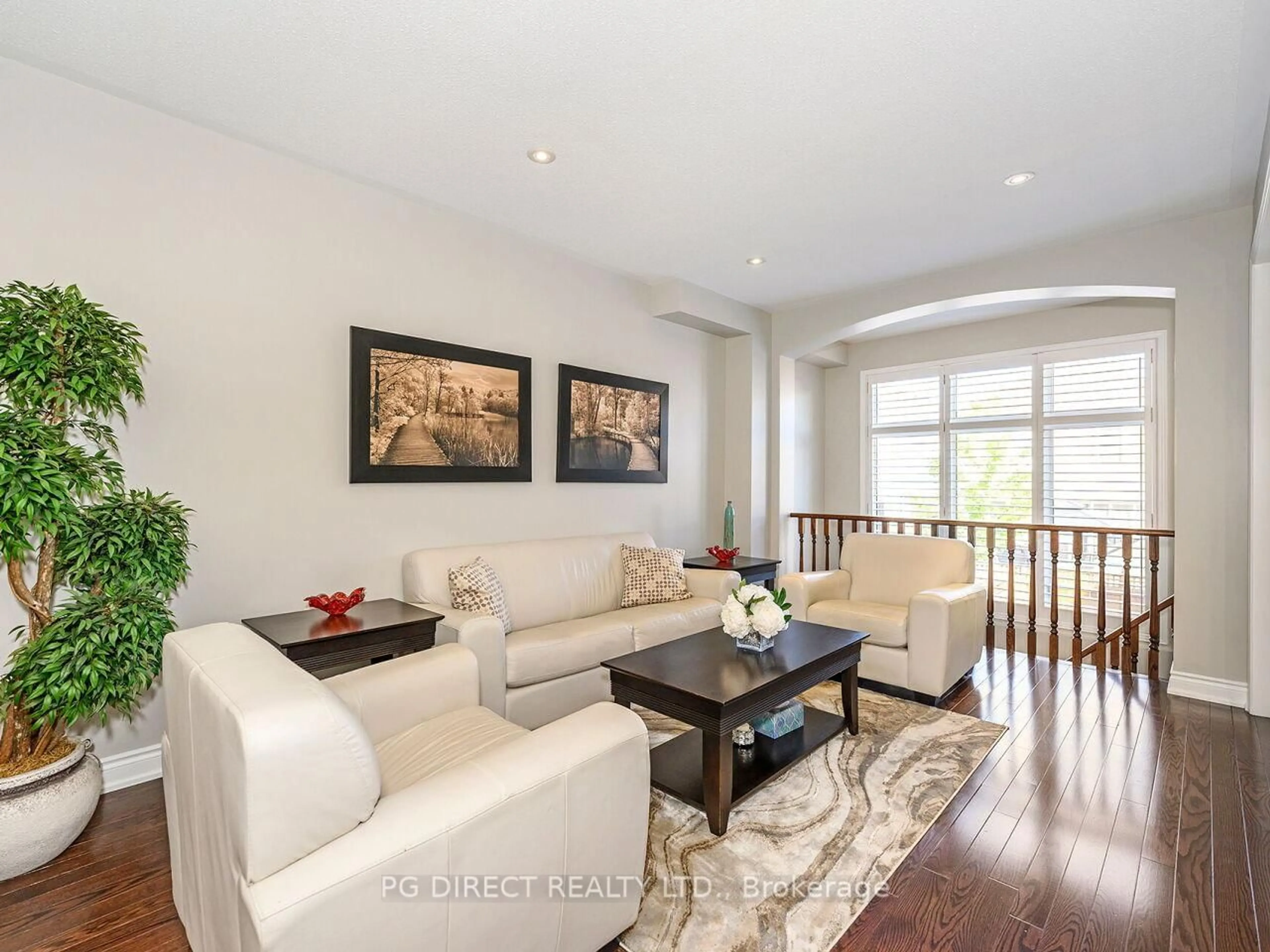 Living room with furniture, wood/laminate floor for 4142 Judson Common, Burlington Ontario L7M 0G4