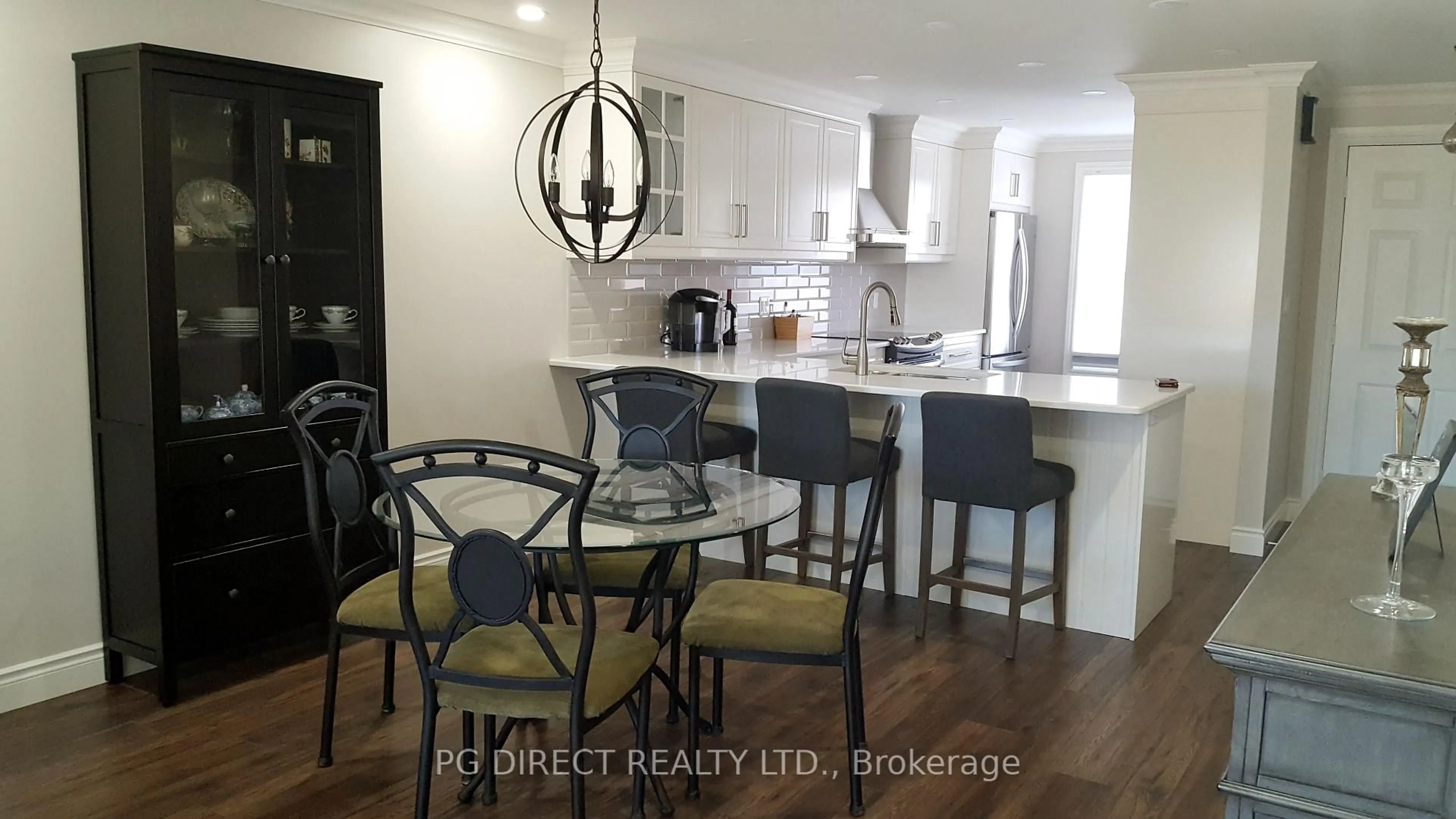 Open concept kitchen, wood/laminate floor for 1210 Thorpe Rd #317, Burlington Ontario L7S 2G8